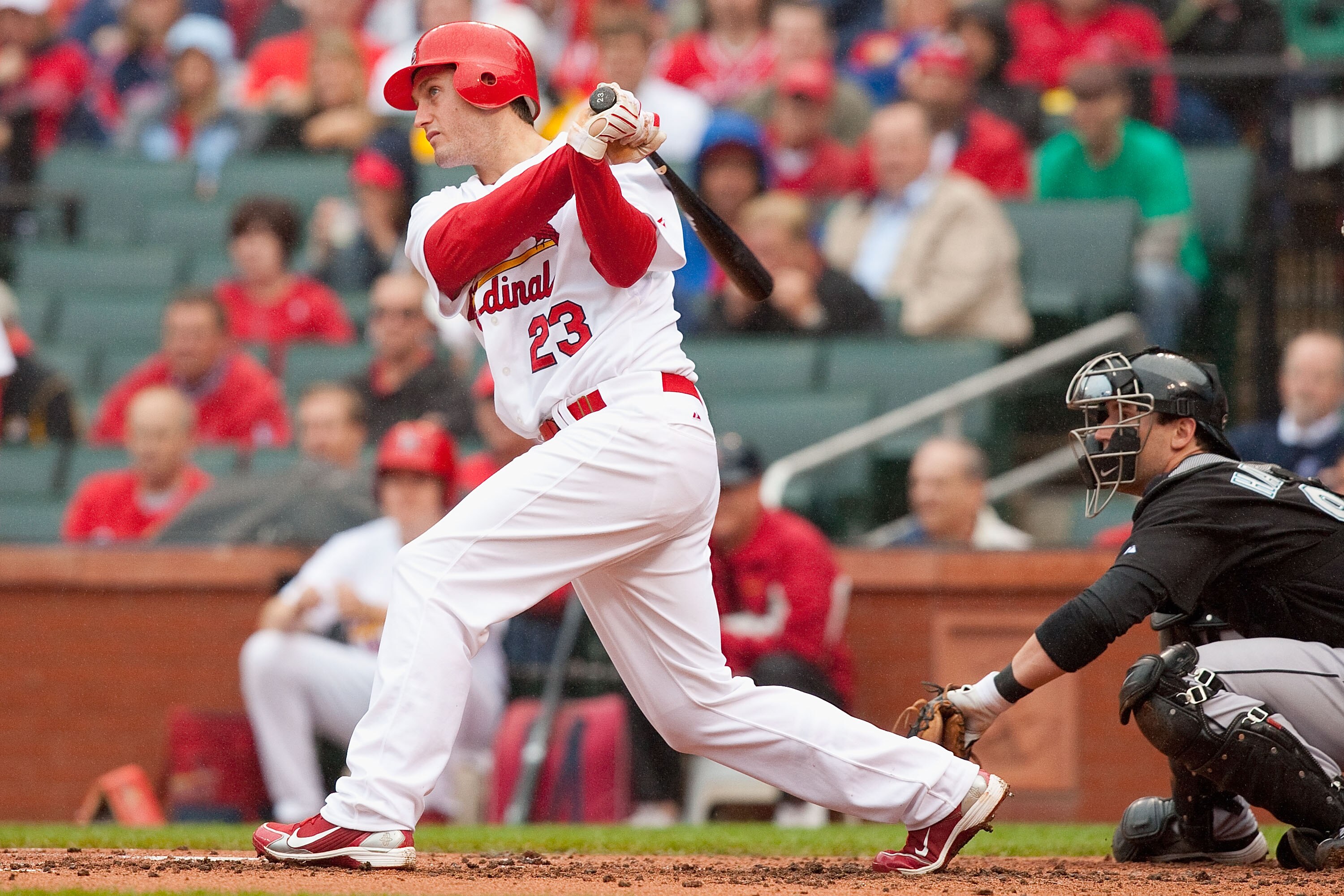 ST. LOUIS - MAY 20: David Freese #23 of the St. Louis Cardinals hits an RBI single against the Florida Marlins at Busch Stadium on May 20, 2010 in St. Louis, Missouri.  The Cardinals beat the Marlins 4-2.  (Photo by Dilip Vishwanat/Getty Images)