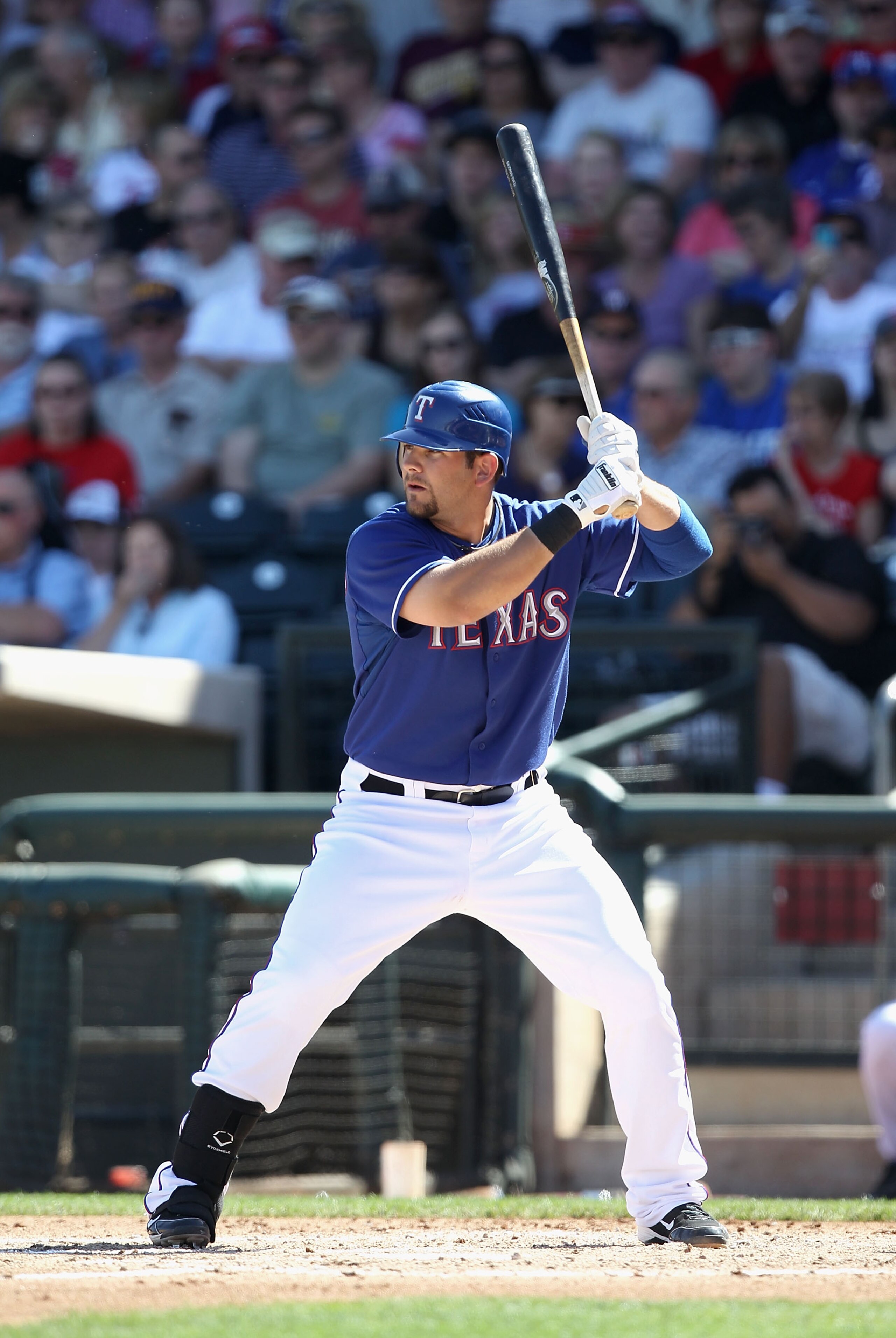 SURPRISE, AZ - MARCH 11:  Mitch Moreland #18 of the Texas Rangers bats against the Cincinnati Reds during the spring training game at Surprise Stadium on March 11, 2011 in Surprise, Arizona.  (Photo by Christian Petersen/Getty Images)