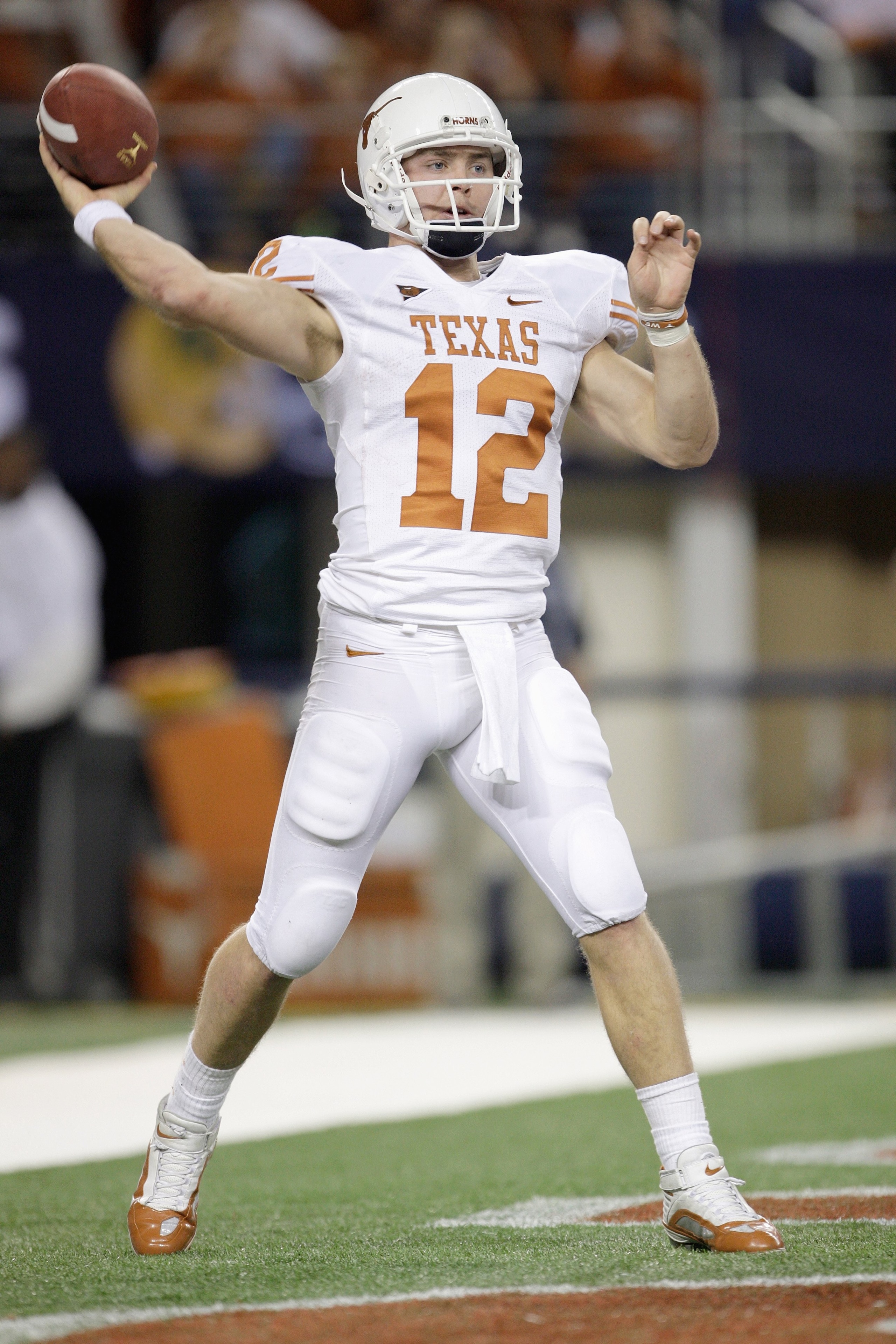 ARLINGTON, TX - DECEMBER 5: Colt McCoy #12 of the Texas Longhorns looks to pass the ball during the Big 12 Football Championship game against the Nebraska Cornhuskers at Cowboys Stadium on December 5, 2009 in Arlington, Texas. (Photo by Jamie Squire/Getty