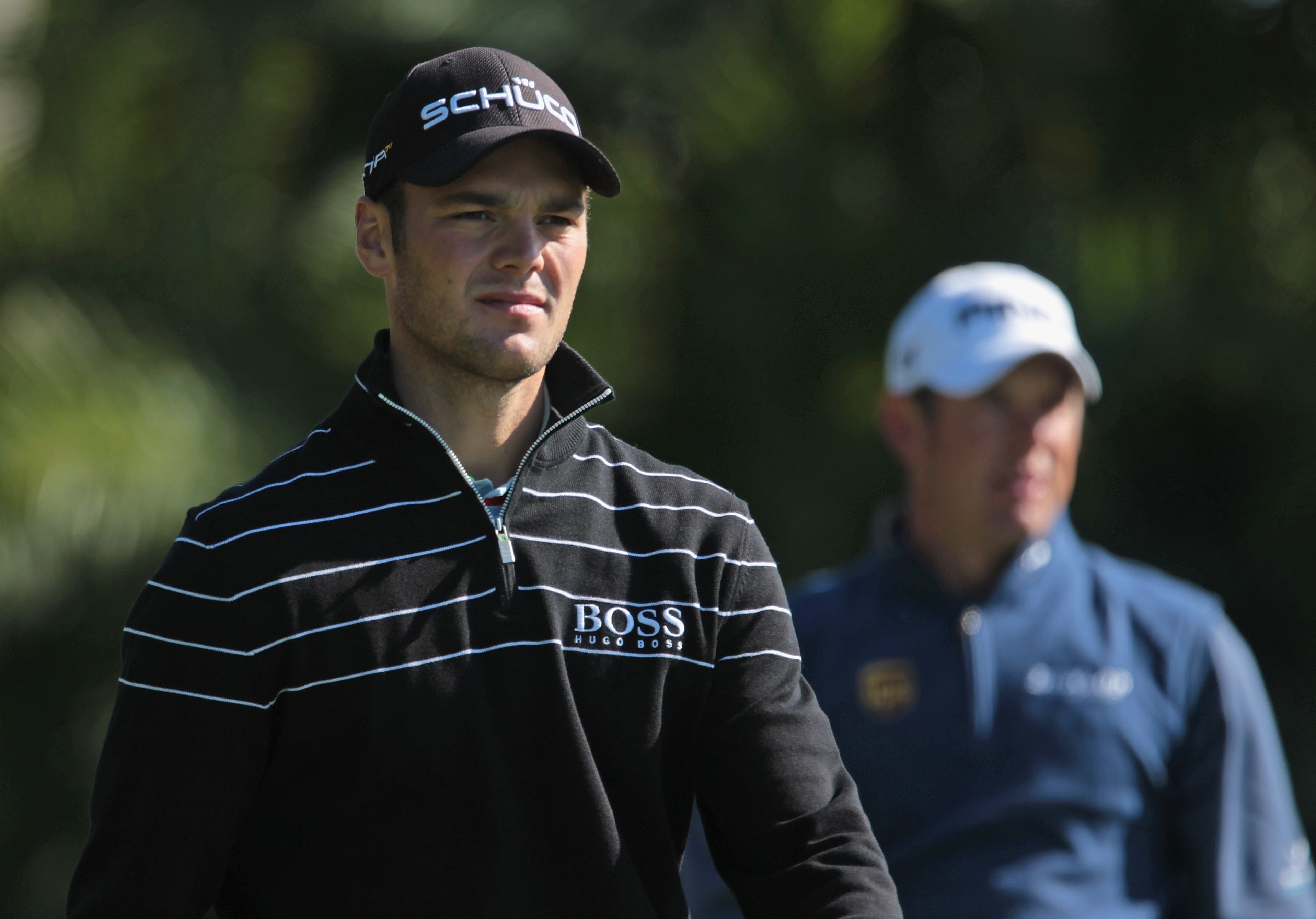 DORAL, FL - MARCH 11: Martin Kaymer of Germany (L) and Lee Westwood of England walk off the 15th tee during the completion of the first round of the 2011 WGC- Cadillac Championship at the TPC Blue Monster at the Doral Golf Resort and Spa on March 11, 201 DORAL, FL - MARCH 11: Martin Kaymer of Germany (L) and Lee Westwood of England walk off the 15th tee during the completion of the first round of the 2011 WGC- Cadillac Championship at the TPC Blue Monster at the Doral Golf Resort and Spa on March 11, 201