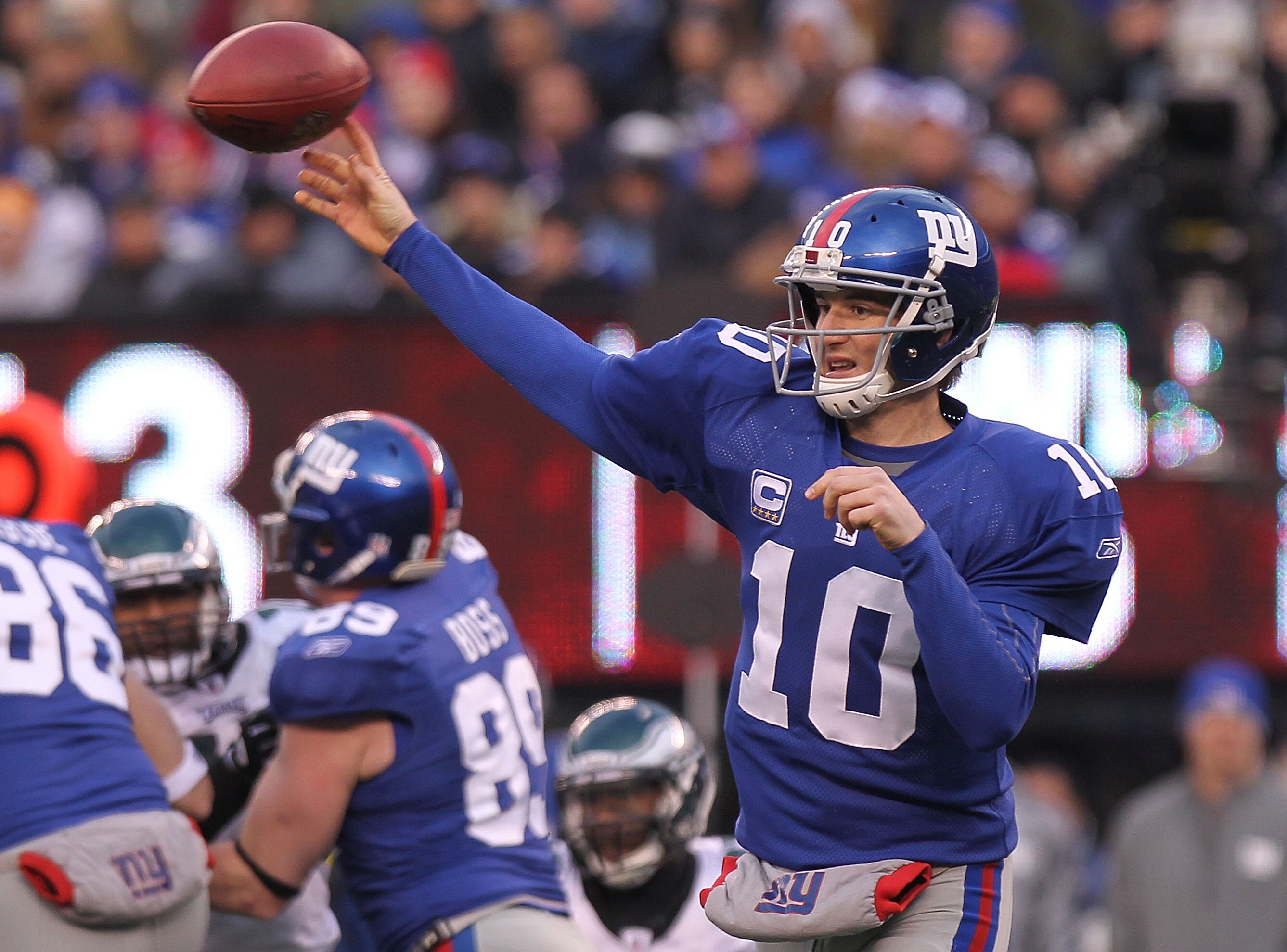 EAST RUTHERFORD, NJ - DECEMBER 19:  Eli Manning #10 of the New York Giants passes against the Philadelphia Eagles at New Meadowlands Stadium on December 19, 2010 in East Rutherford, New Jersey.  (Photo by Nick Laham/Getty Images)