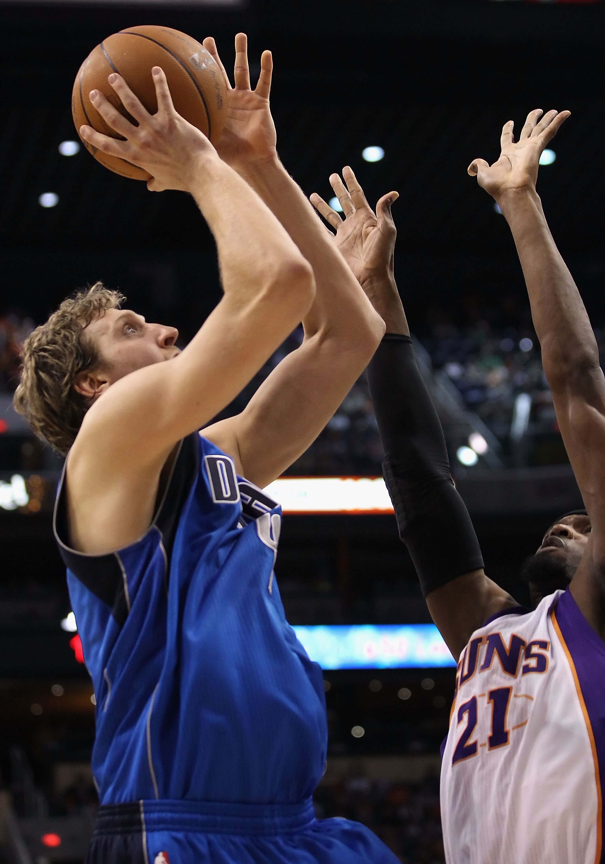 PHOENIX, AZ - MARCH 27:  Dirk Nowitzki #41 of the Dallas Mavericks puts up a shot during the NBA game against the Phoenix Suns at US Airways Center on March 27, 2011 in Phoenix, Arizona.  The Mavericks defeated the Suns 91-83.  NOTE TO USER: User expressl