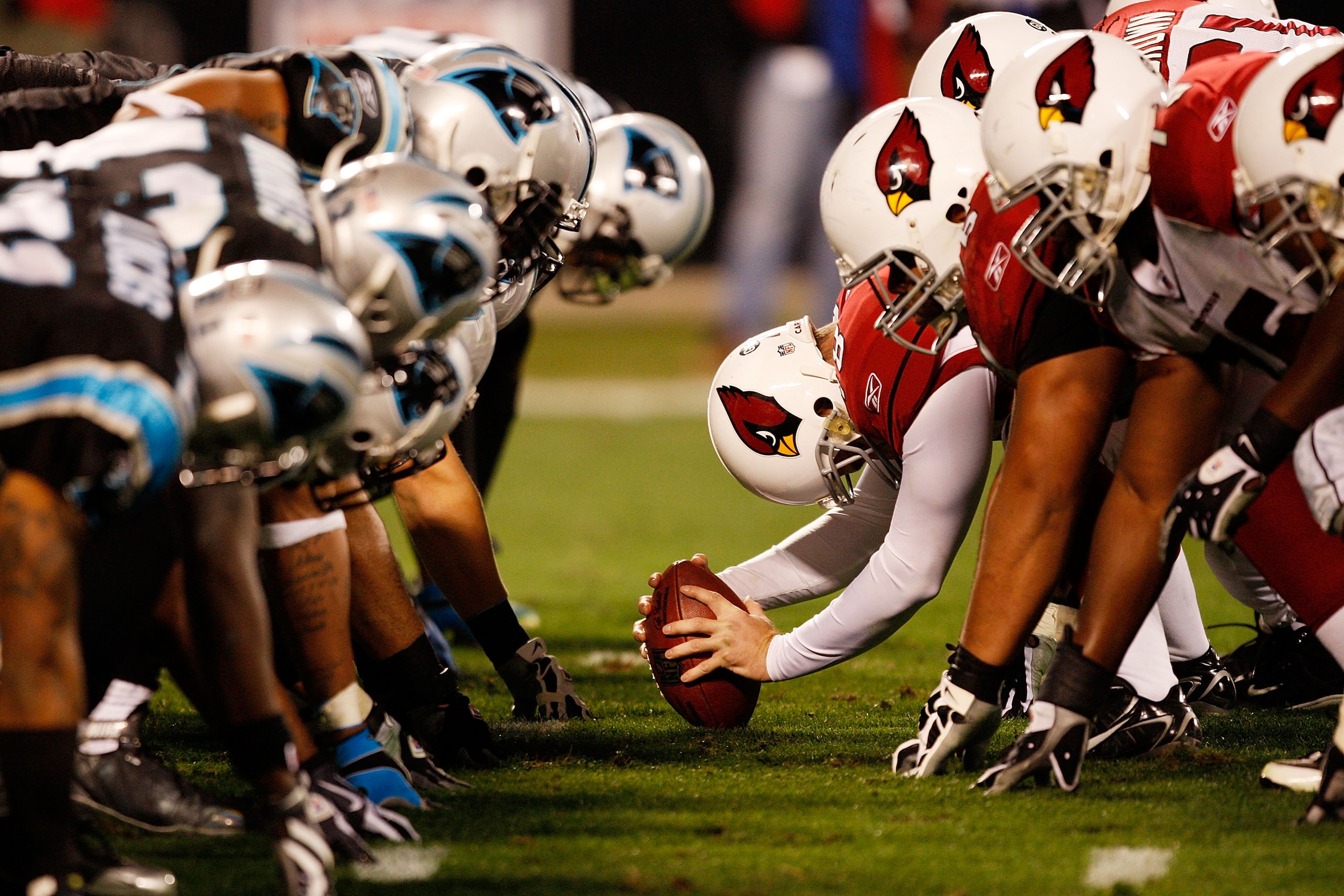 CHARLOTTE, NC - JANUARY 10:  The defense of the Carolina Panthers line up against the offense of the Arizona Cardinals during the NFC Divisional Playoff Game on January 10, 2009 at Bank of America Stadium in Charlotte, North Carolina.  (Photo by Streeter