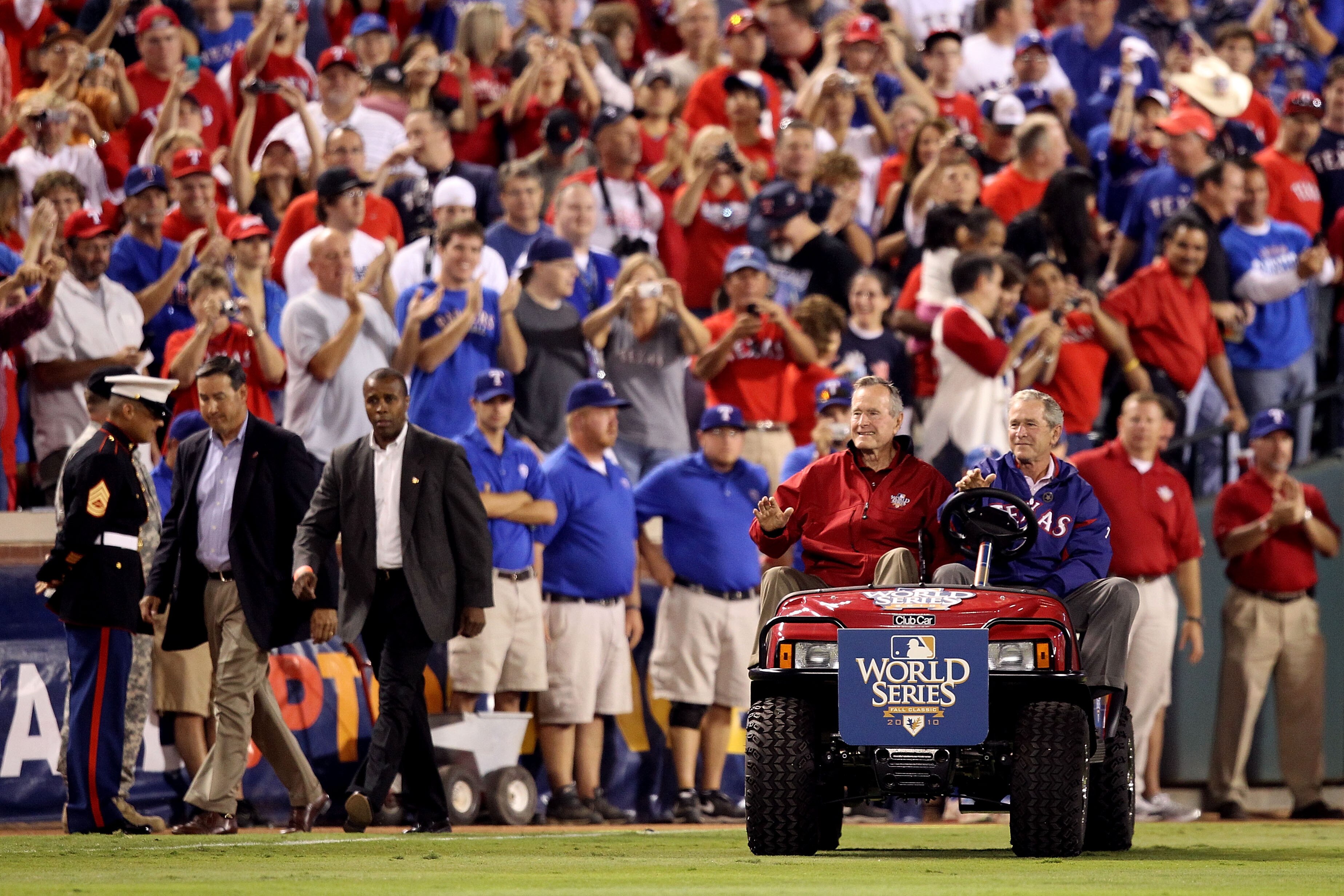 ARLINGTON, TX - OCTOBER 31:  Former President of the United States, George W. Bush, and his father Former President George H.W. Bush waves to the crowd before the Texas Rangers host the San Francisco Giants in Game Four of the 2010 MLB World Series at Ran