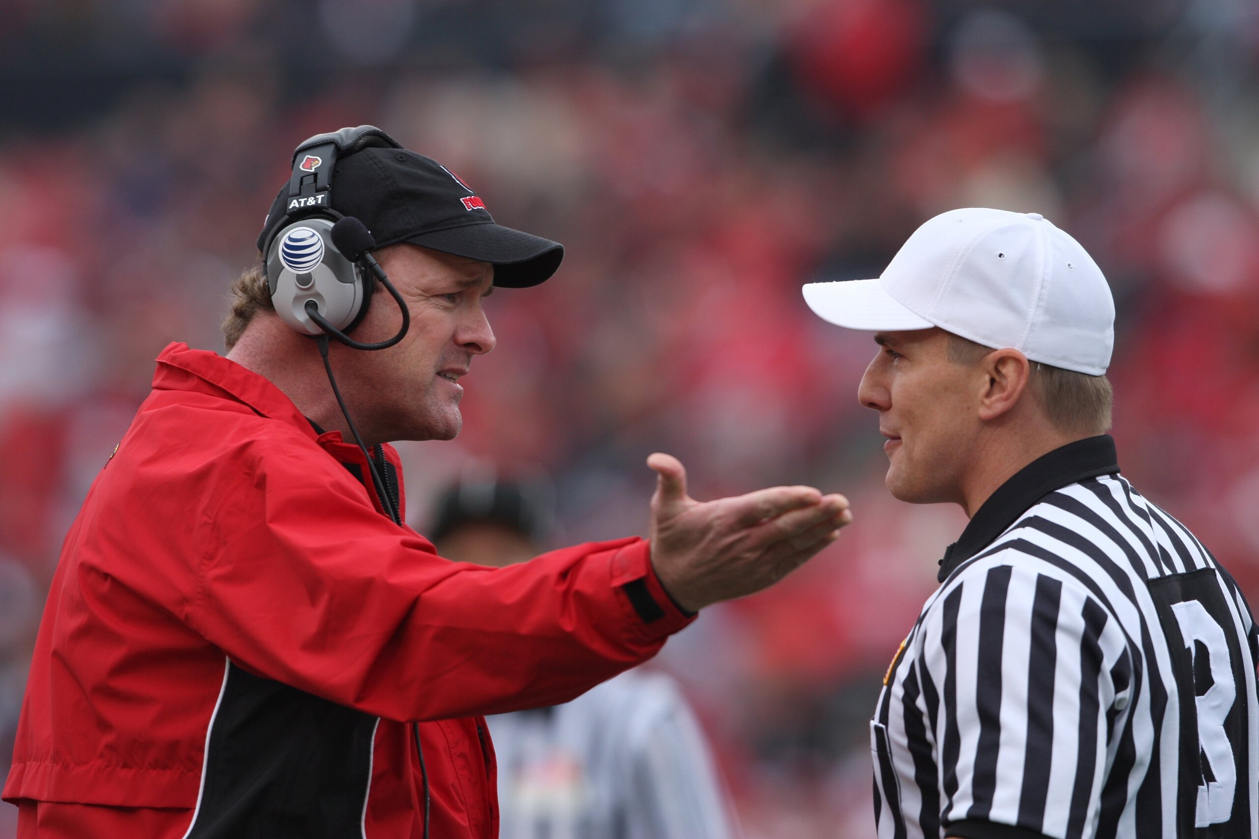 LOUISVILLE - OCTOBER 27:  Head coach Steve Kragthorpe of the Louisville Cardinals argues with the referee during the game against the Pittsburgh Panthers at Papa John?s Cardinal Stadium on October 27, 2007 in Louisville, Kentucky. (Photo by Andy Lyons/Get