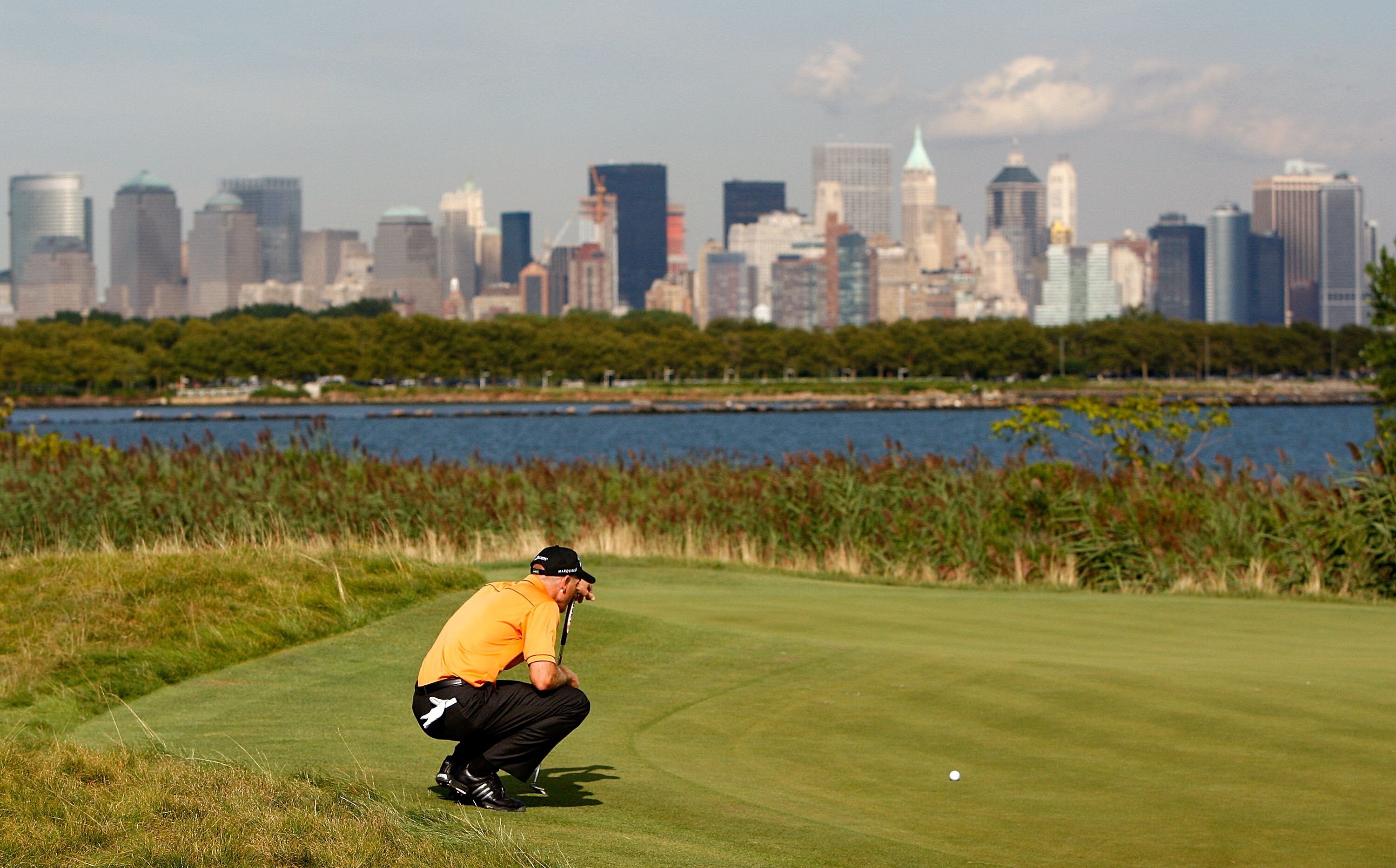 JERSEY CITY, NJ - AUGUST 27:  Jim Furyk lines up a putt during round one at The Barclays on August 27, 2009 at Liberty National in Jersey City, New Jersey.  (Photo by Kevin C. Cox/Getty Images)