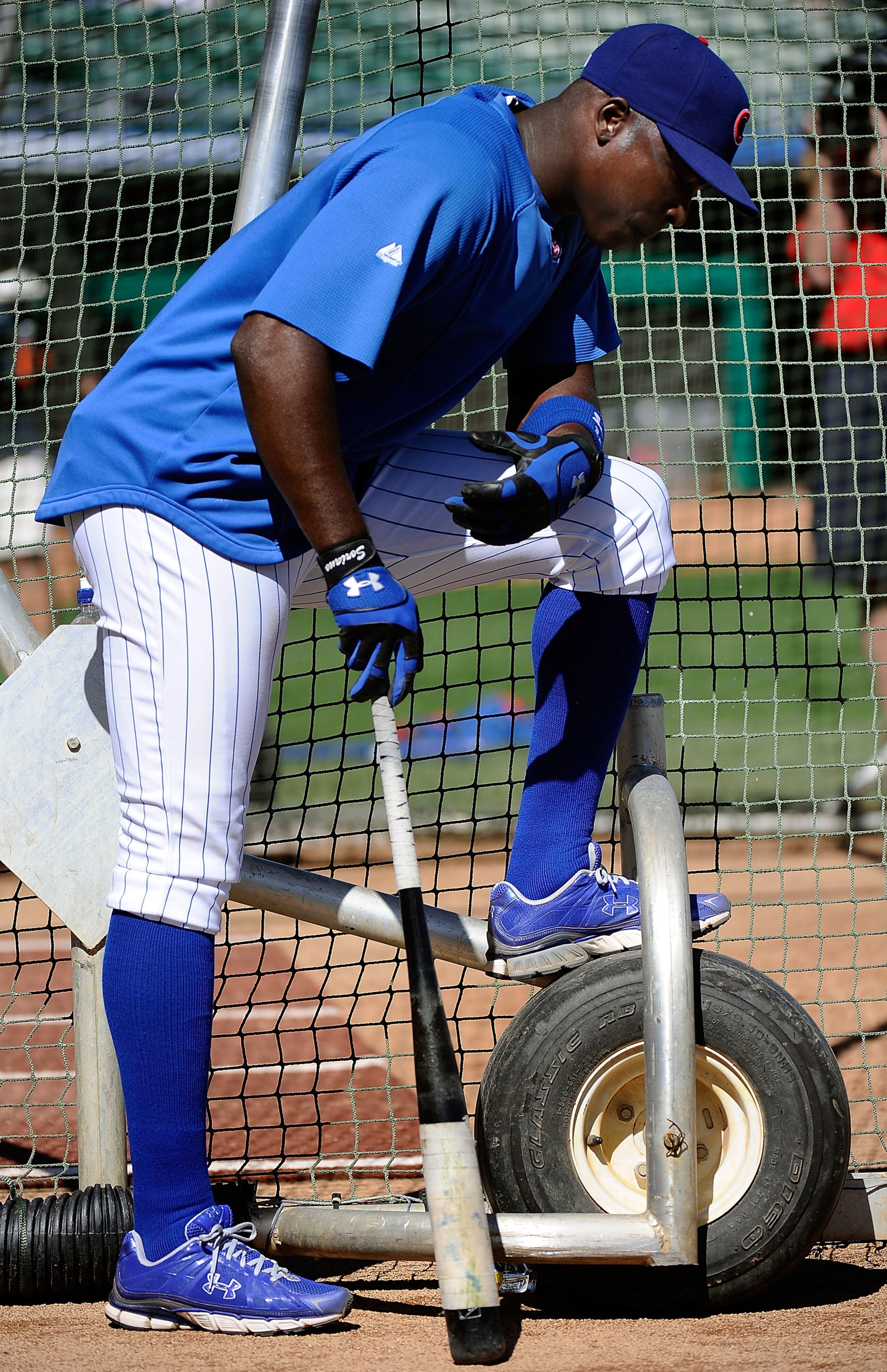 MESA, AZ - MARCH 09:  Alfonso Soriano #12 of the Chicago Cubs attends batting practice before the spring training baseball game against the Kansas City Royals at HoHoKam Stadium on March 9, 2011 in Mesa, Arizona.  (Photo by Kevork Djansezian/Getty Images)