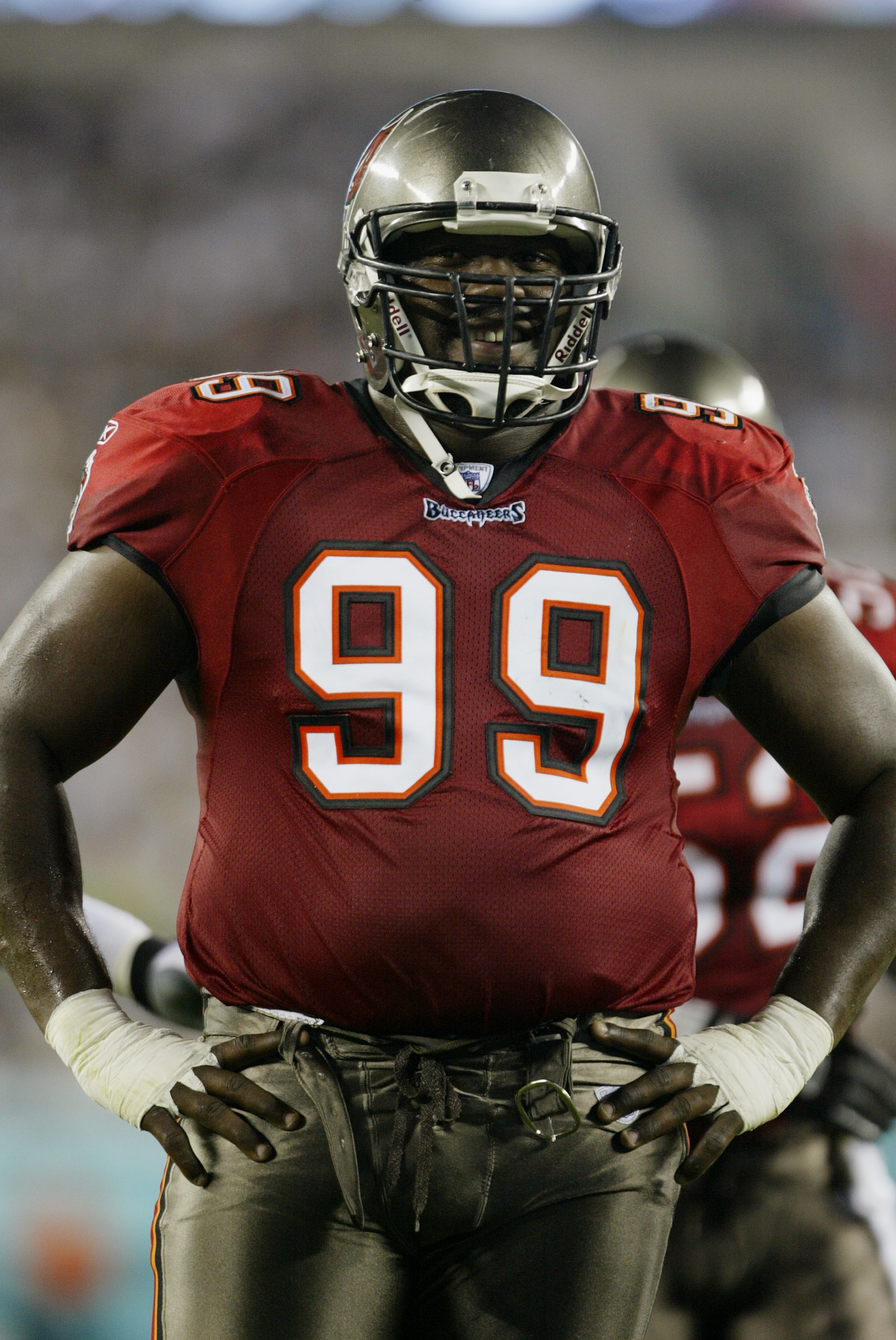 PHILADELPHIA - SEPTEMBER 8:  Warren Sapp #99 of the Tampa Bay Buccaneers smiles during the game against the Philadelphia Eagles on September 8, 2003 at Lincoln Financial Field in Philadelphia, Pennsylvania.  The Buccaneers defeated the Eagles 17-0 in the