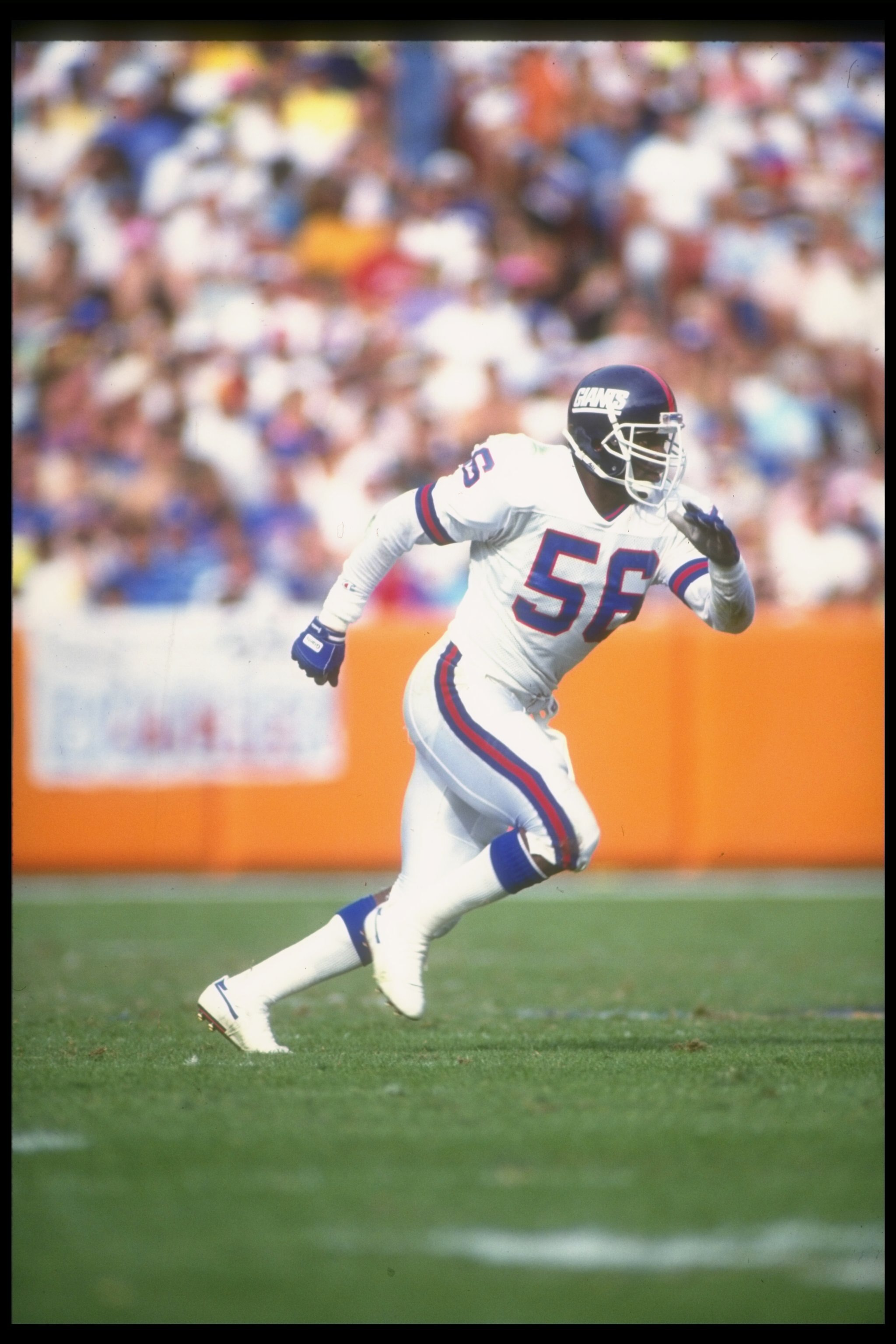 11 Nov 1990:  Linebacker Lawrence Taylor of the New York Giants moves down the field during a game against the Los Angeles Rams at Anaheim Stadium in Anaheim, California.  The Giants won the game, 31-7. Mandatory Credit: Stephen Dunn  /Allsport
