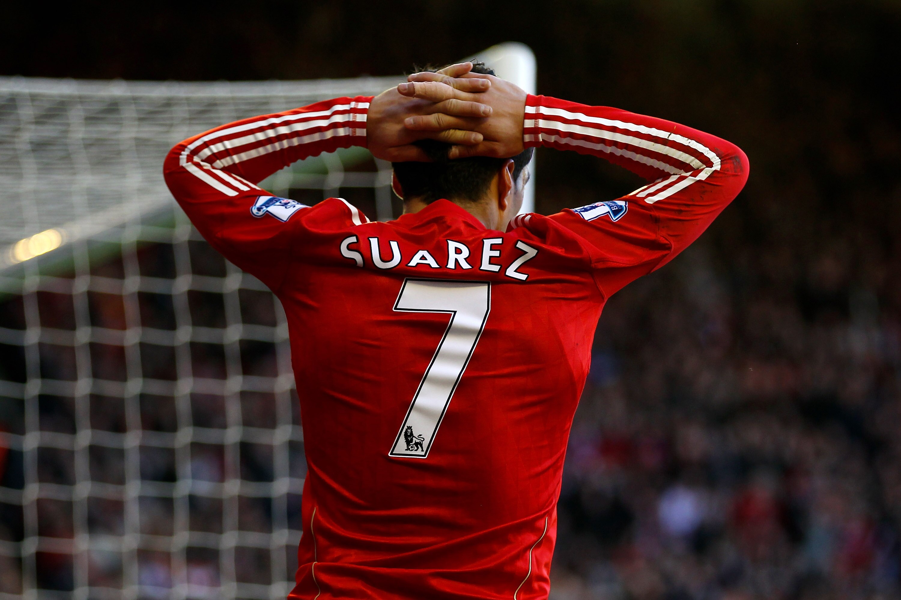 LIVERPOOL, ENGLAND - FEBRUARY 12:  Luis Suarez of Liverpool reacts to a missed chance during the Barclays Premier League match between Liverpool and Wigan Athletic at Anfield on February 12, 2011 in Liverpool, England.  (Photo by Clive Brunskill/Getty Ima