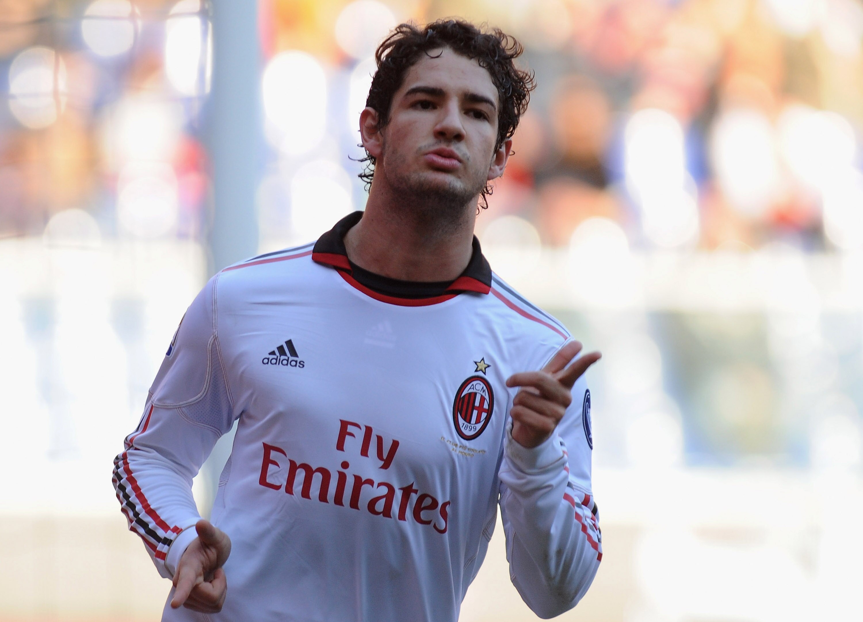 GENOA, ITALY - FEBRUARY 06:  Pato of AC Milan celebrates after scoring the opening goal during the Serie A match between Genoa CFC and AC Milan at Stadio Luigi Ferraris on February 6, 2011 in Genoa, Italy.  (Photo by Valerio Pennicino/Getty Images)