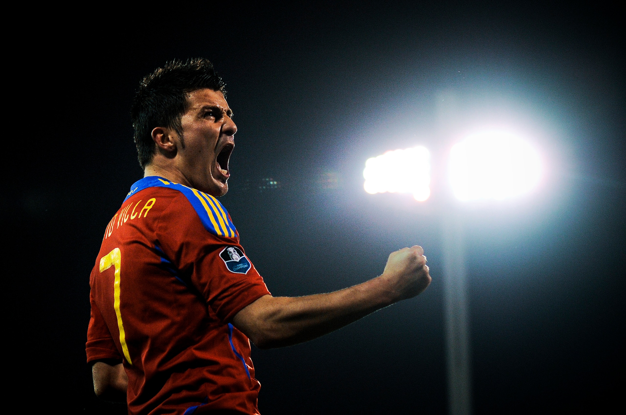 GRANADA, SPAIN - MARCH 25:  David Villa of Spain (R) celebrates after scoring his second goal during the UEFA EURO 2012 qualifier between Spain and Czech Republic at Los Carmenes Stadium on March 25, 2011 in Granada, Spain.  Spain win 2-1. (Photo by David