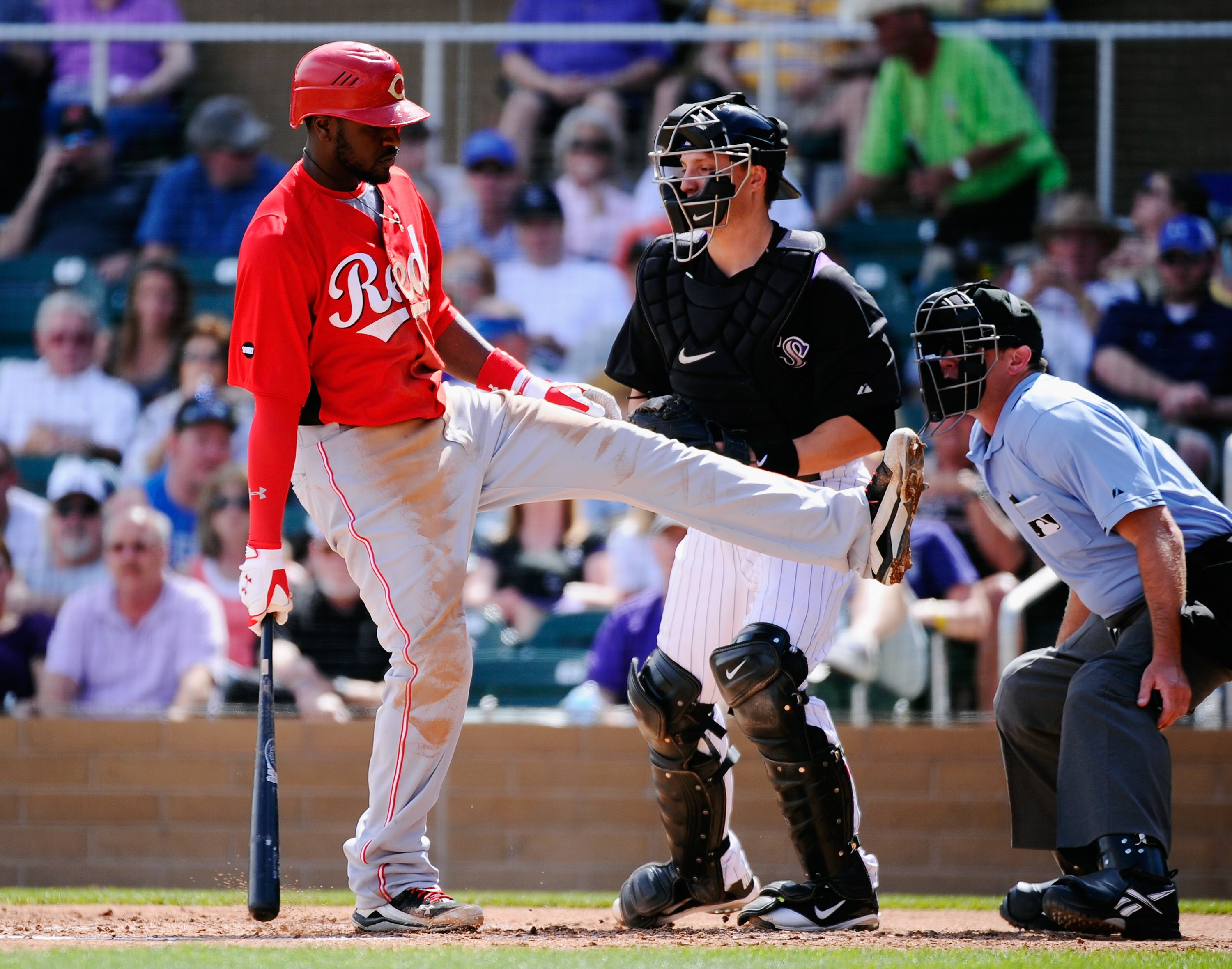 SCOTTSDALE, AZ - MARCH 14:  Brandon Phillips #4 of the Cincinnati Reds against the Colorodo Rockies during the spring training baseball game at Salt River Fields at Talking Stick on March 14, 2011 in Scottsdale, Arizona.  (Photo by Kevork Djansezian/Getty
