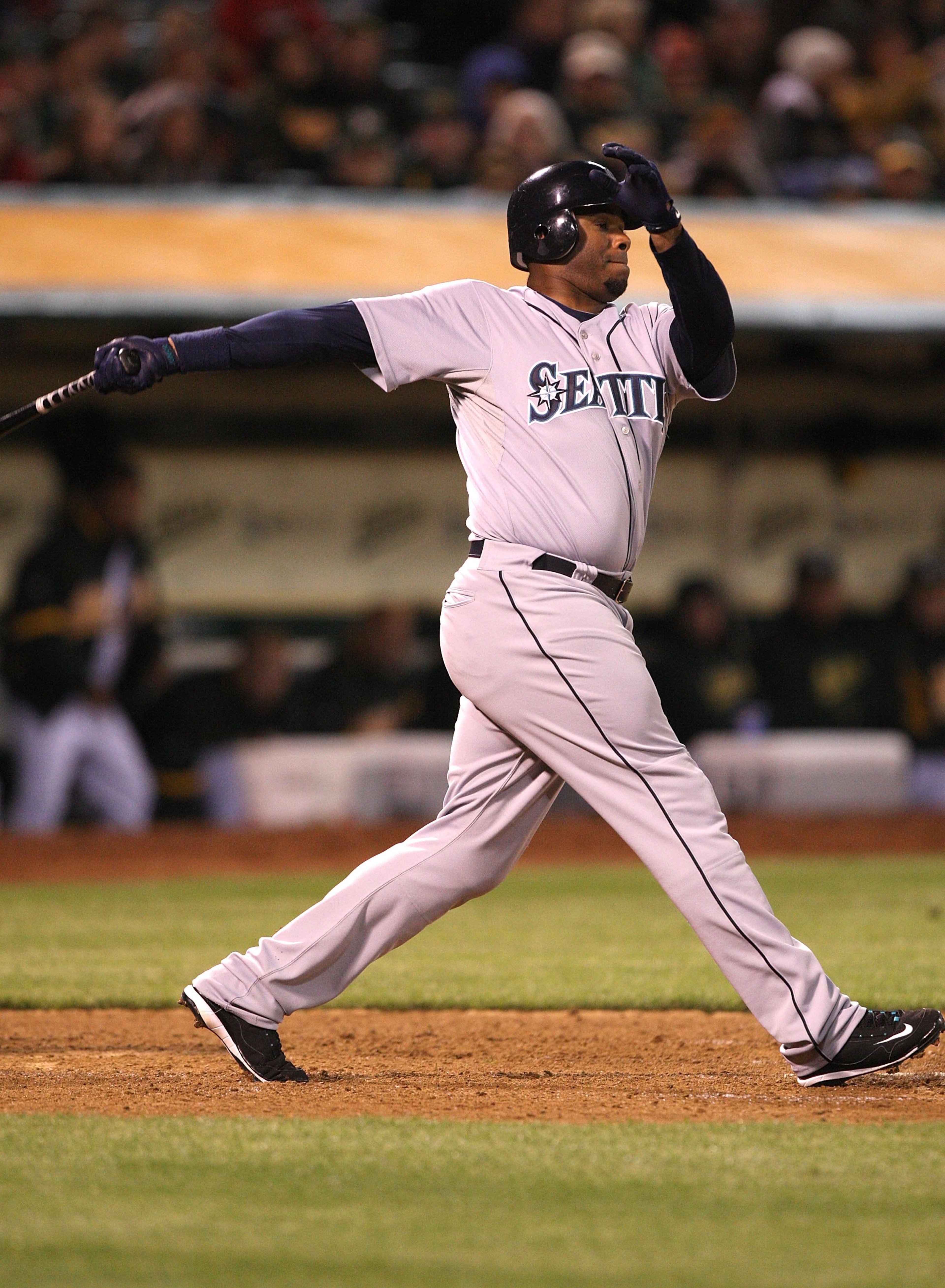 OAKLAND, CA - APRIL 10:  Ken Griffey Jr #24 of the Seattle Mariners bats against the Oakland Athletics  during Opening Day at a Major League Baseball game on April 10, 2009 at the Oakland Coliseum in Oakland, California.  (Photo by Jed Jacobsohn/Getty Ima