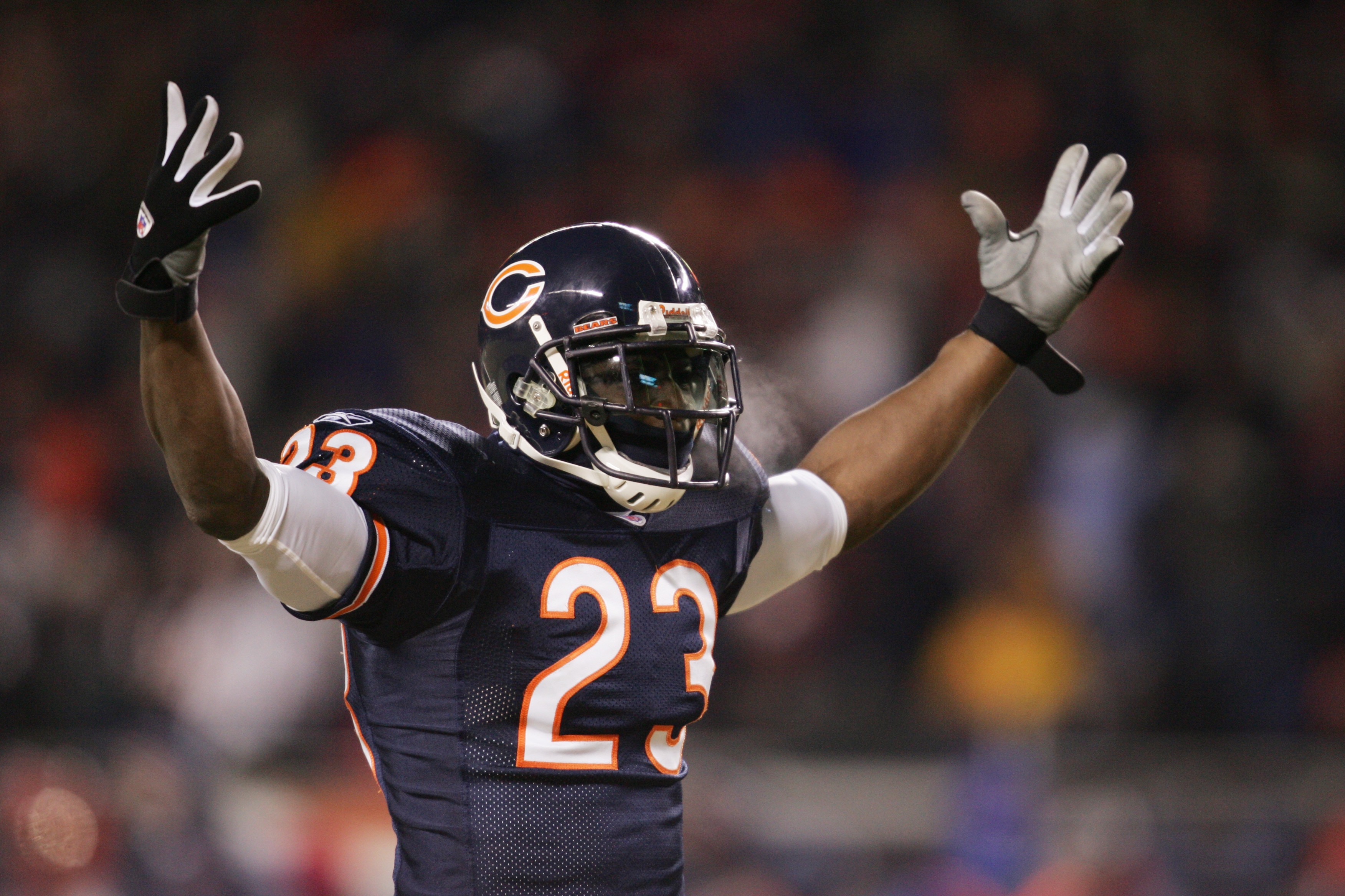 CHICAGO - DECEMBER 18:  Cornerback Jerry Azumah #23 of the Chicago Bears celebrates against the Atlanta Falcons at Soldier Field on December 18, 2005 in Chicago, Illinois. The Bears defeated the Falcons 16-3. (Photo by Jonathan Daniel/Getty Images)