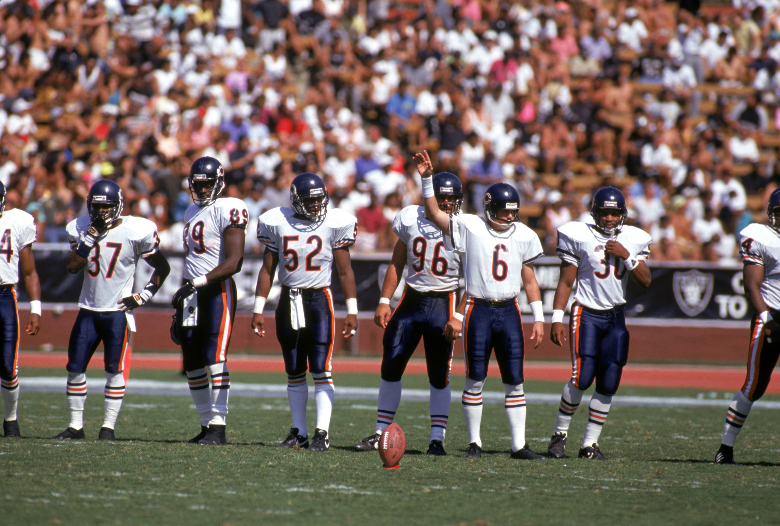 LOS ANGELES - SEPTEMBER 30:  Kicker Kevin Butler #6 and the Chicago Bears kick off team get set to kick to the Los Angeles Raiders during a game at the Los Angeles Memorial Coliseum on September 30, 1990 in Los Angeles, California.  The Raiders won 24-10.