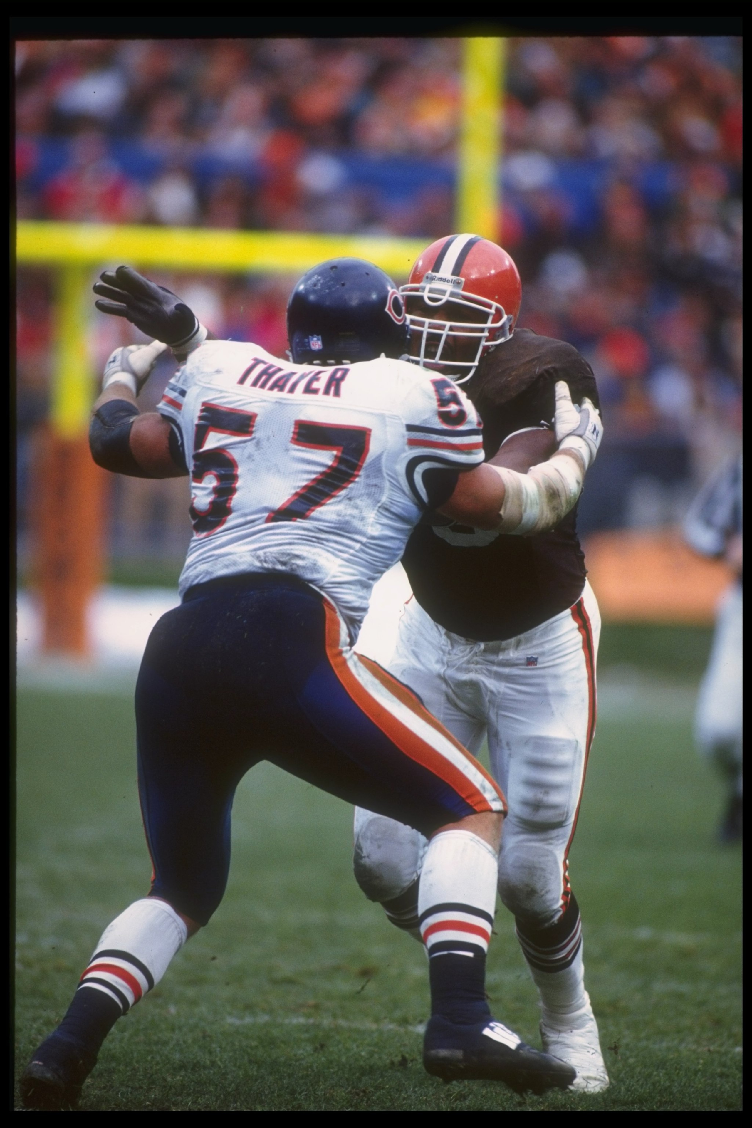29 Nov 1992: Defensive lineman Rob Burnett of the Cleveland Browns works against Chicago Bears offensive lineman Tom Thayer during a game at Soldier Field in Chicago, Illinois. The Browns won the game, 27-14.