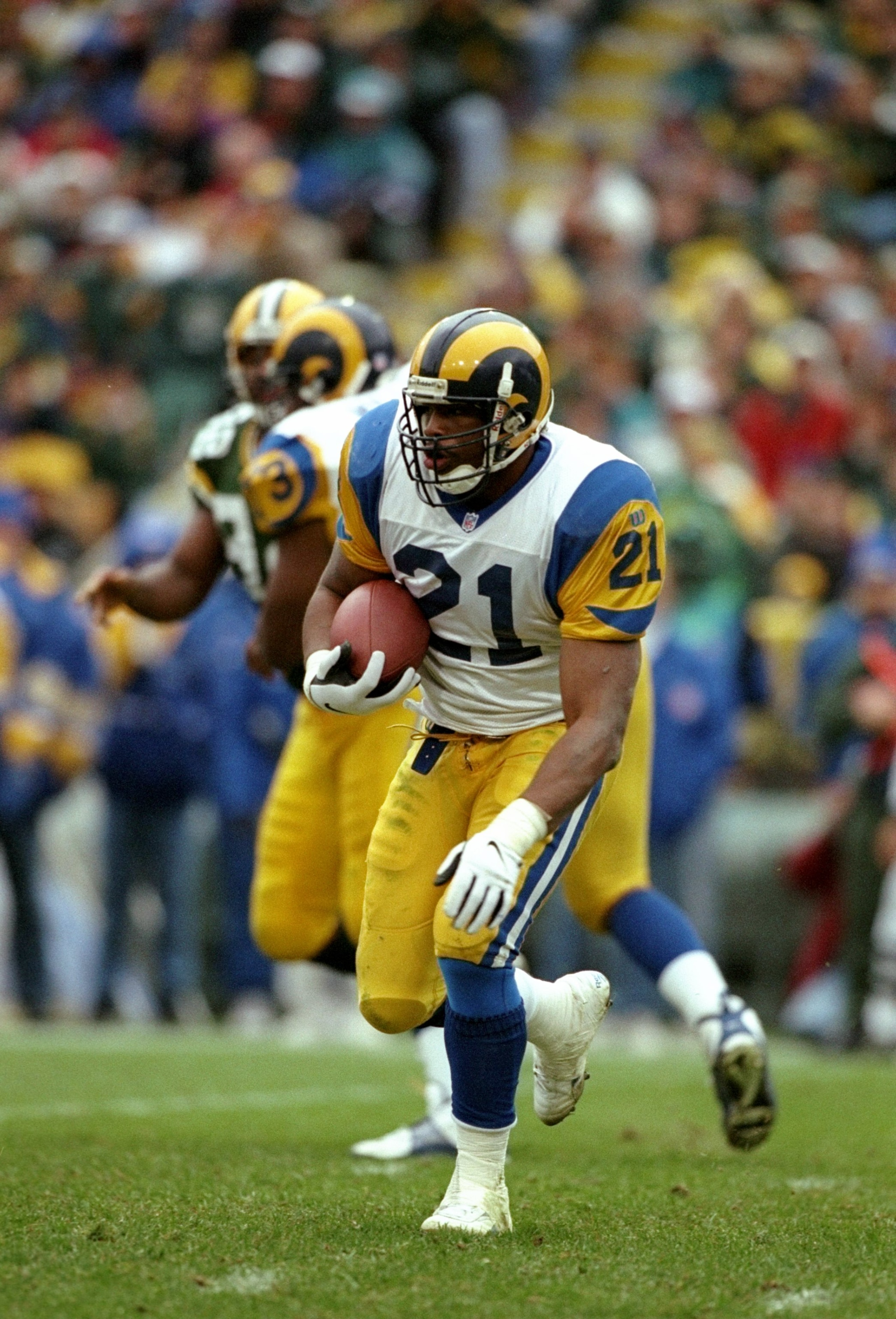 9 Nov 1997: Running back Lawrence Phillips of the St. Louis Rams runs with the ball during a game against the Green Bay Packers at Lambeau Field in Green Bay, Wisconsin. The Packers won the game 17-7. Mandatory Credit: Jonathan Daniel /Allsport 9 Nov 1997: Running back Lawrence Phillips of the St. Louis Rams runs with the ball during a game against the Green Bay Packers at Lambeau Field in Green Bay, Wisconsin. The Packers won the game 17-7. Mandatory Credit: Jonathan Daniel /Allsport