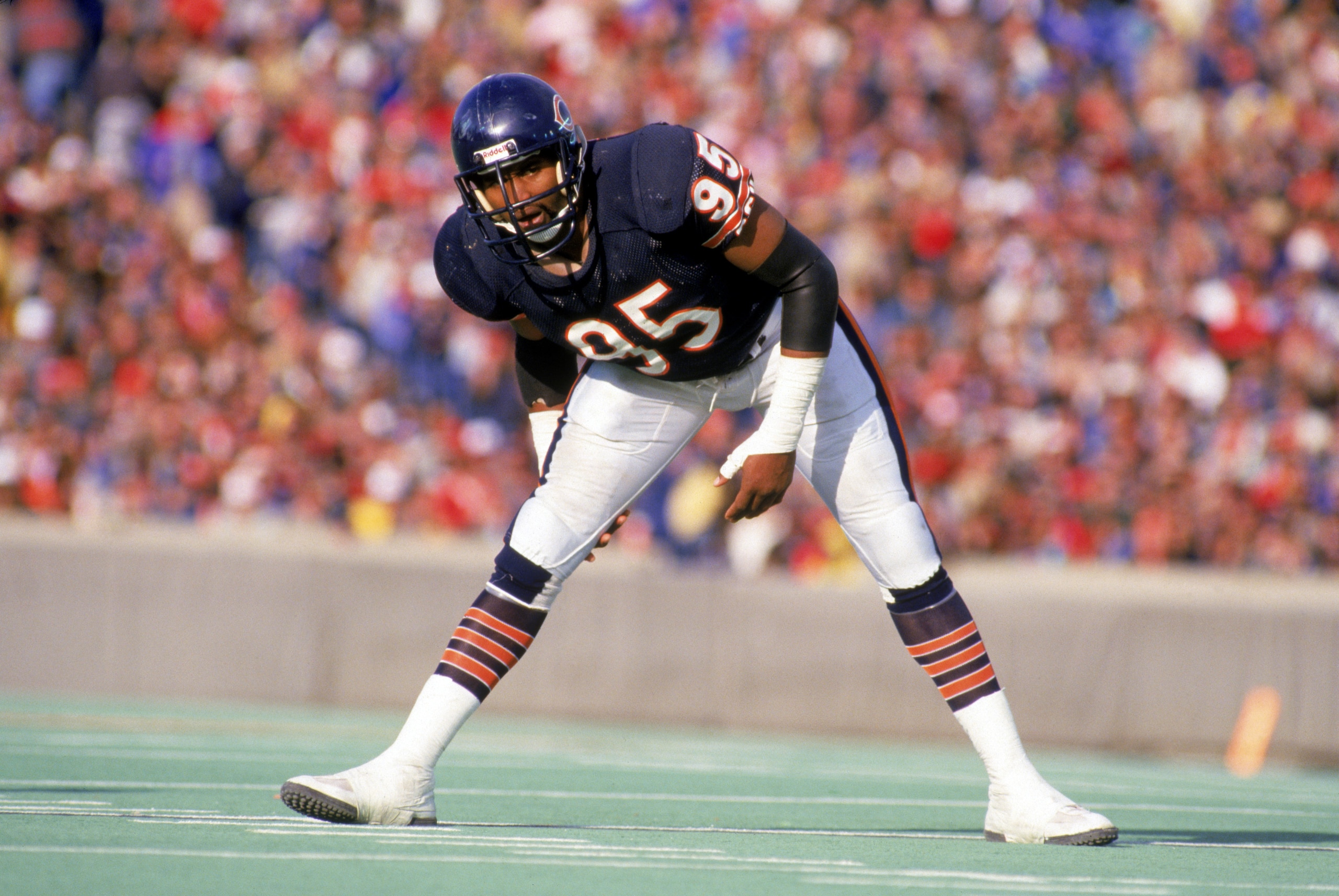 CHICAGO - NOVEMBER:  Defensive end Richard Dent #95 of the Chicago Bears stretches during game in November of 1987 at Soldier Field in Chicago, Illinois.  (Photo by Jonathan Daniel/Getty Images)