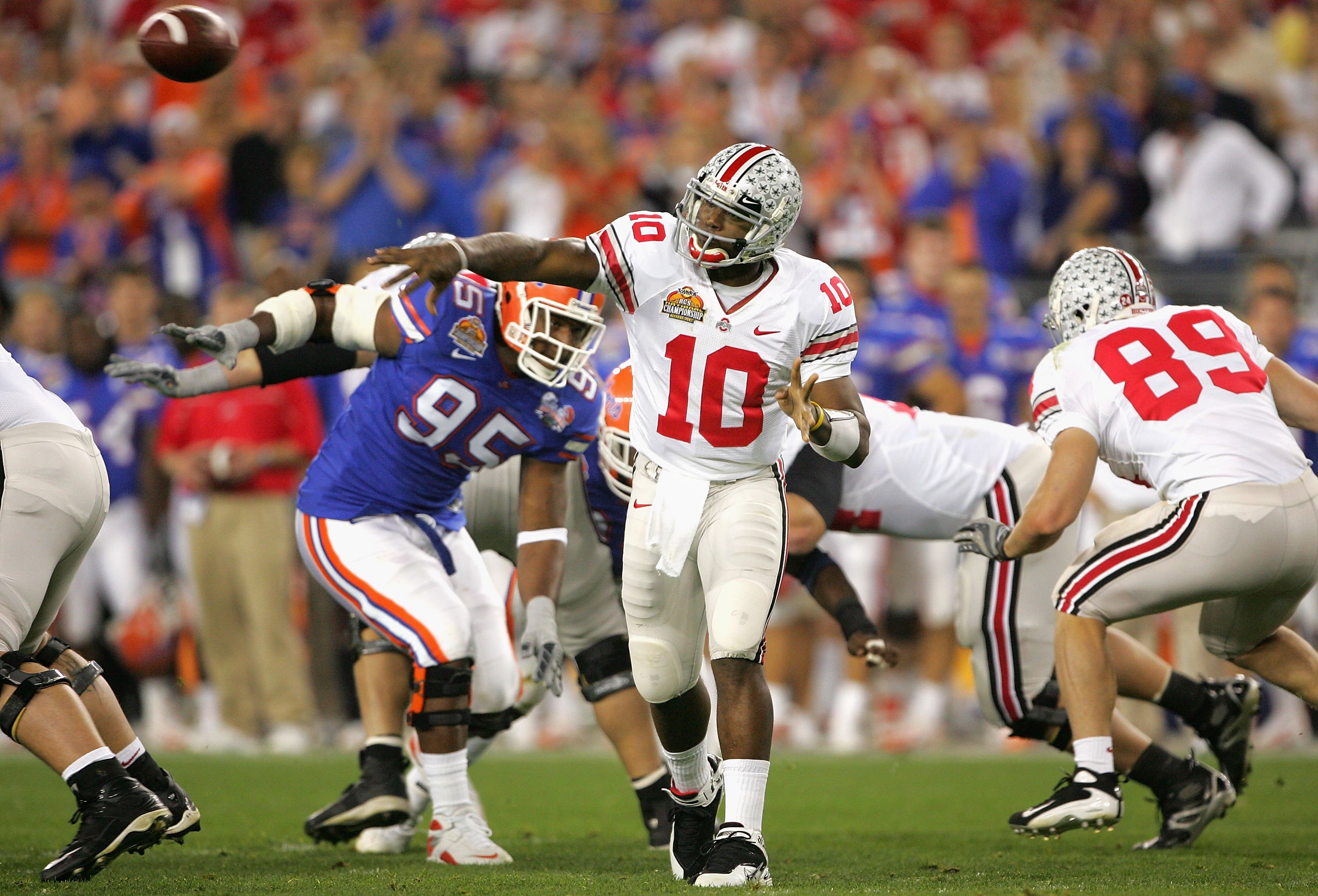 GLENDALE, AZ - JANUARY 08:  Quarterback Troy Smith #10 of the Ohio State Buckeyes attempts a pass against the Florida Gators during the 2007 Tostitos BCS National Championship Game at the University of Phoenix Stadium on January 8, 2007 in Glendale, Arizo