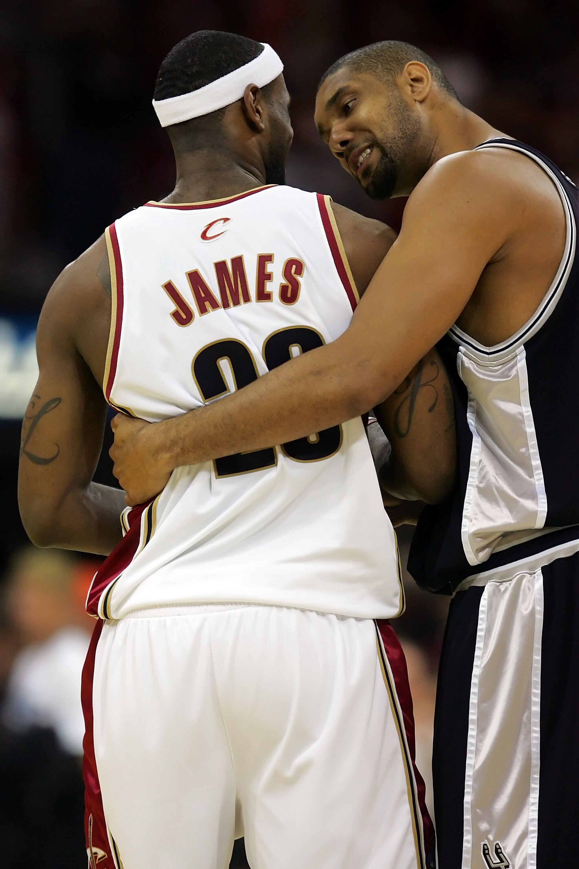 CLEVELAND - JUNE 14: Tim Duncan #21 of the San Antonio Spurs talks with LeBron James #23 of the Cleveland Cavaliers before Game Four of the NBA Finals on June 14, 2007 at the Quicken Loans Arena in Cleveland, Ohio. NOTE TO USER: User expressly acknowledge
