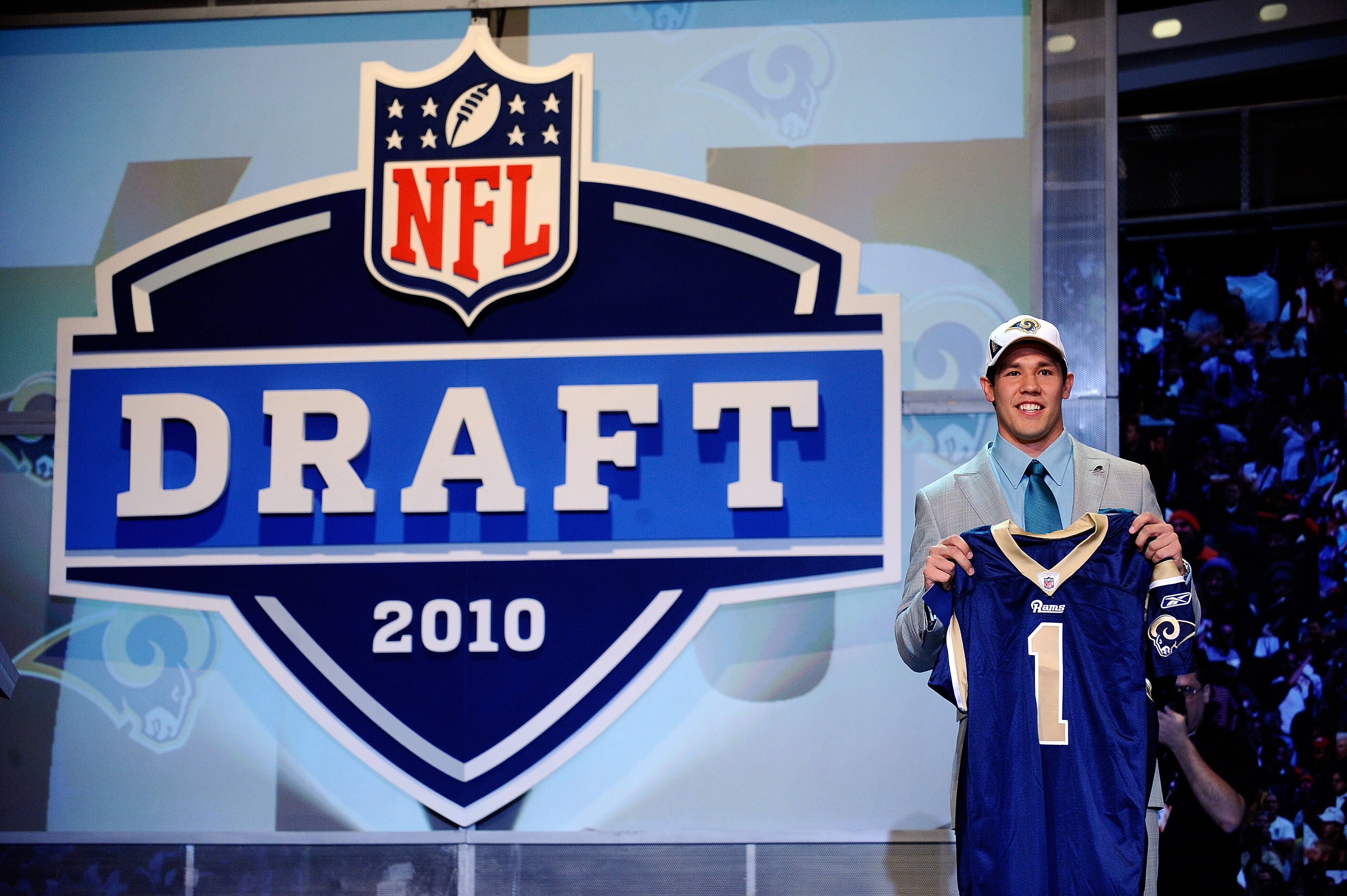 NEW YORK - APRIL 22:  Quarterback Sam Bradford of the Oklahoma Soomers holds up a St. Louis Rams jersey after he was picked numer 1 overall by the Rams during the 2010 NFL Draft at Radio City Music Hall on April 25, 2009 in New York City.  (Photo by Jeff