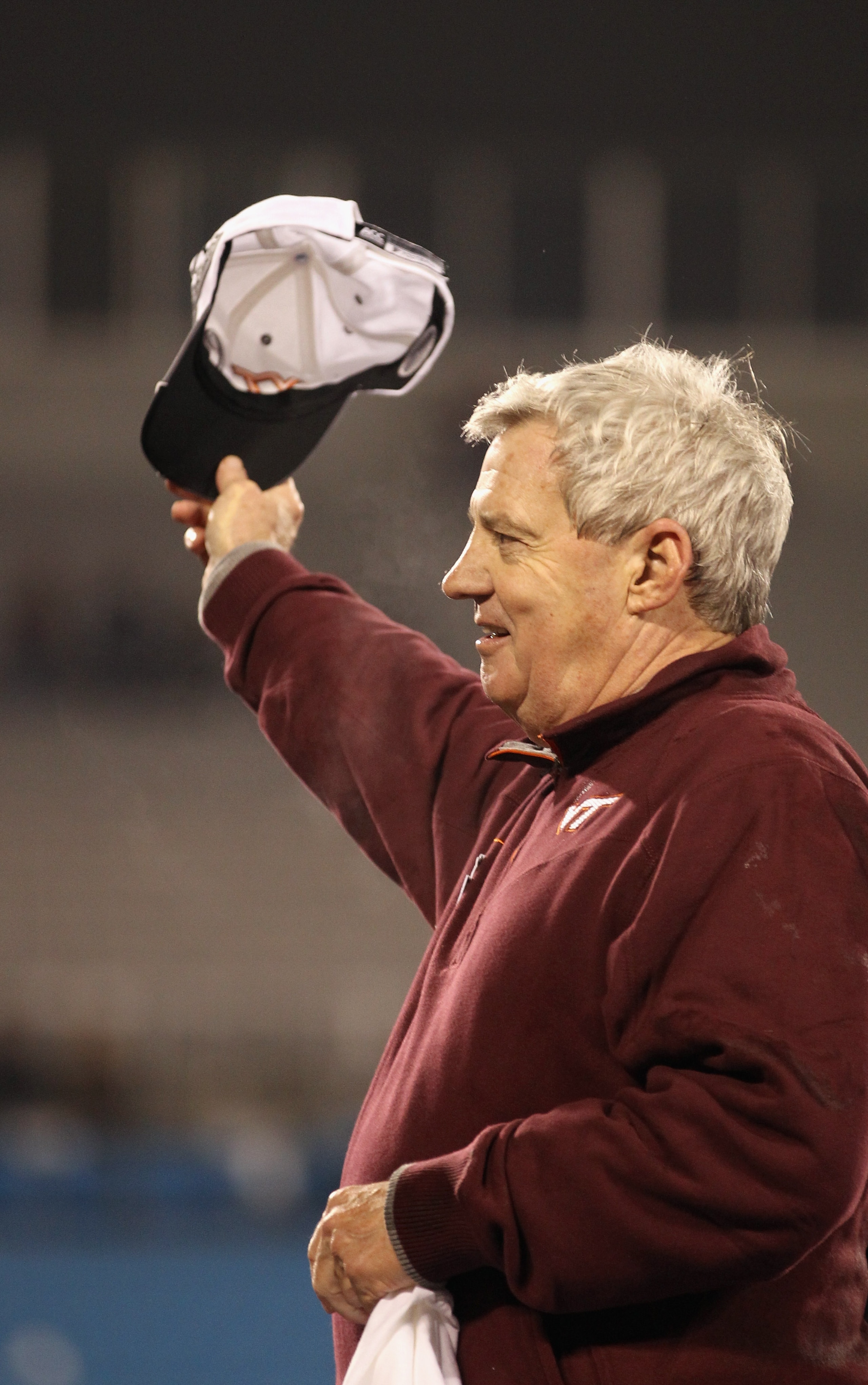 CHARLOTTE, NC - DECEMBER 04:  Head coach Frank Beamer of the Virginia Tech Hokies waves to fans as he celebrates winning the ACC Championship 44-33 at Bank of America Stadium on December 4, 2010 in Charlotte, North Carolina.  (Photo by Streeter Lecka/Gett