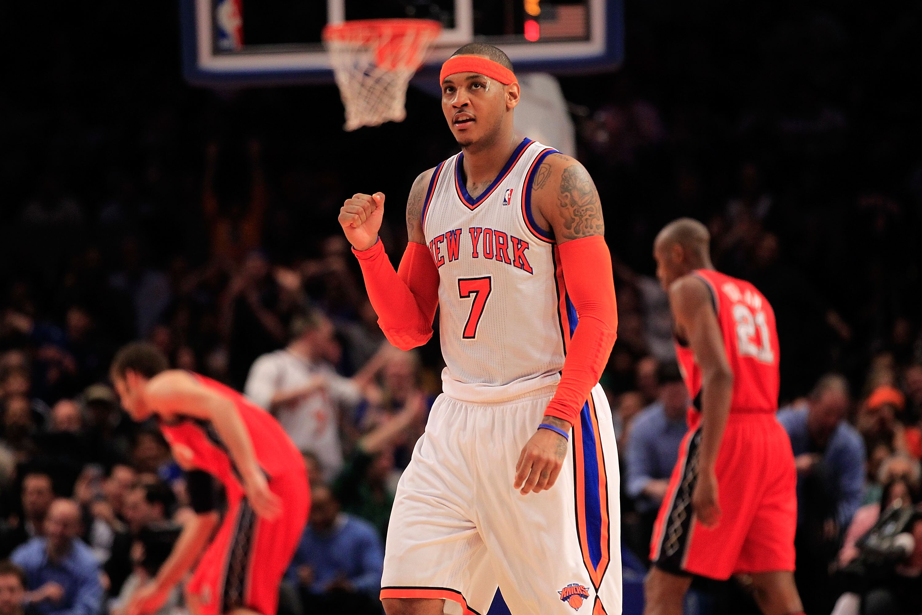 NEW YORK, NY - MARCH 30:  Carmelo Anthony #7 of the New York Knicks celebrates during the game against the New Jersey Nets at Madison Square Garden on March 30, 2011 in New York City. NOTE TO USER: User expressly acknowledges and agrees that, by downloadi