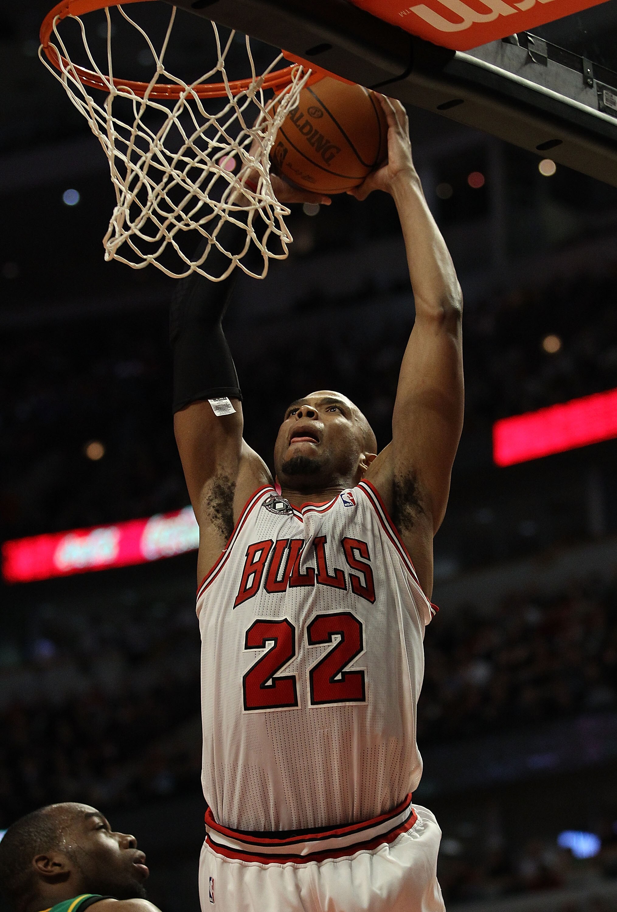 CHICAGO, IL - MARCH 07: Taj Gibson #22 of the Chicago Bulls goes up for a dunk against the New Orleans Hornets at the United Center on March 7, 2011 in Chicago, Illinois. The Bulls defeated the Hornets 85-77. NOTE TO USER: User expressly acknowledges and