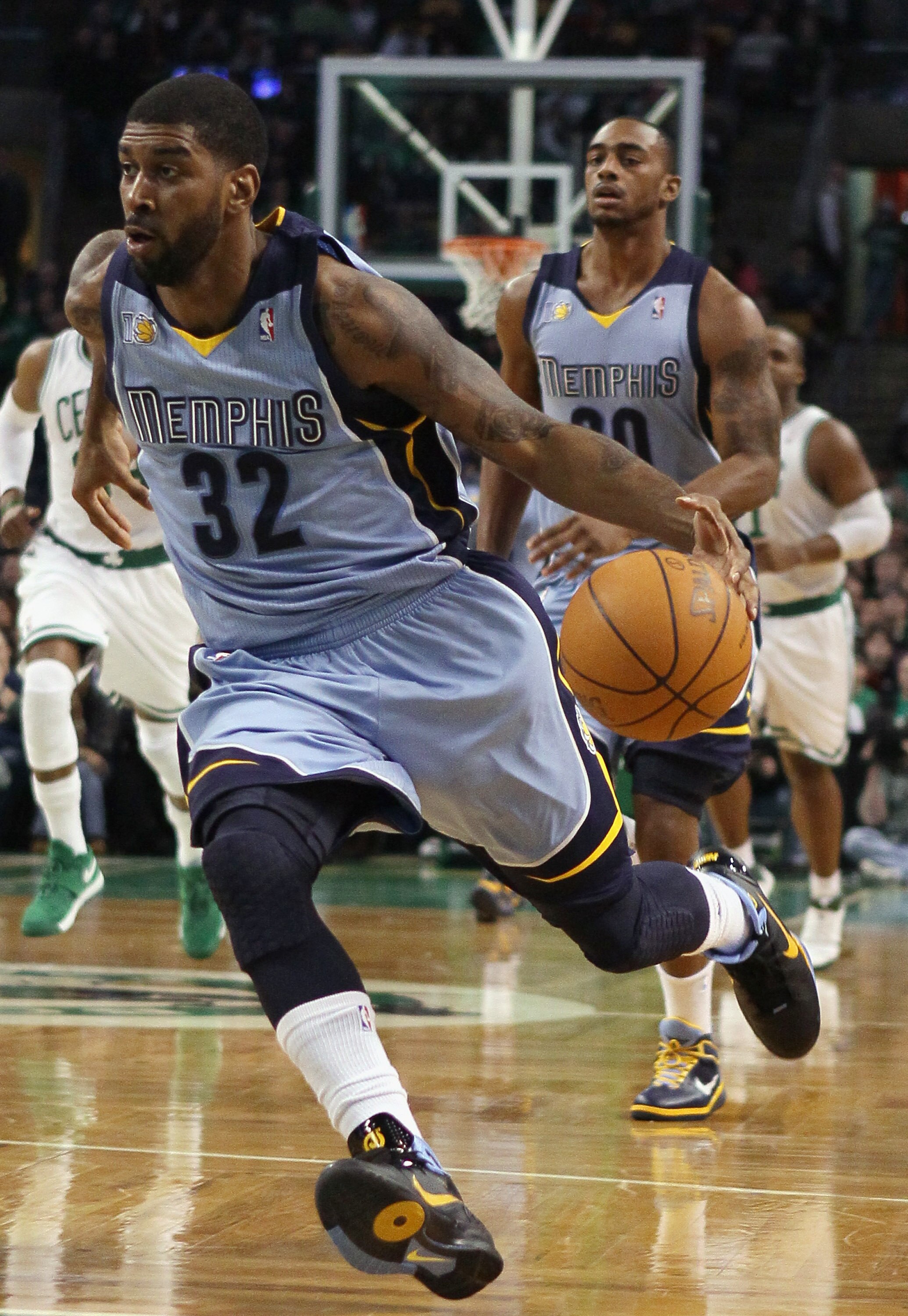 BOSTON, MA - MARCH 23:  O.J. Mayo #32 of the Memphis Grizzlies heads for the net in the first half against the Boston Celtics on March 23, 2011 at the TD Garden in Boston, Massachusetts.  NOTE TO USER: User expressly acknowledges and agrees that, by downl