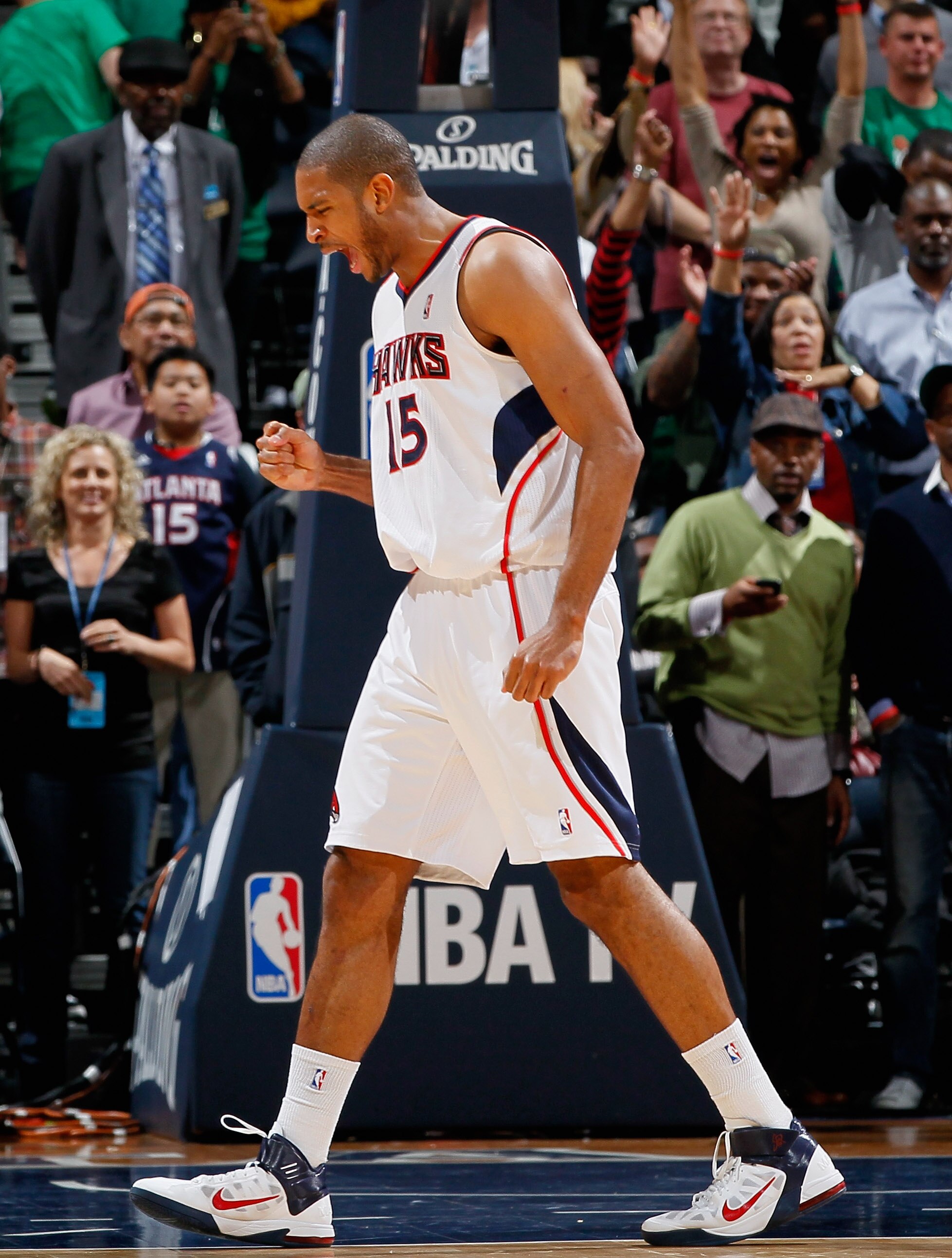 ATLANTA, GA - APRIL 01:  Al Horford #15 of the Atlanta Hawks reacts after their 88-83 win over the Boston Celtics at Philips Arena on April 1, 2011 in Atlanta, Georgia.  NOTE TO USER: User expressly acknowledges and agrees that, by downloading and/or usin