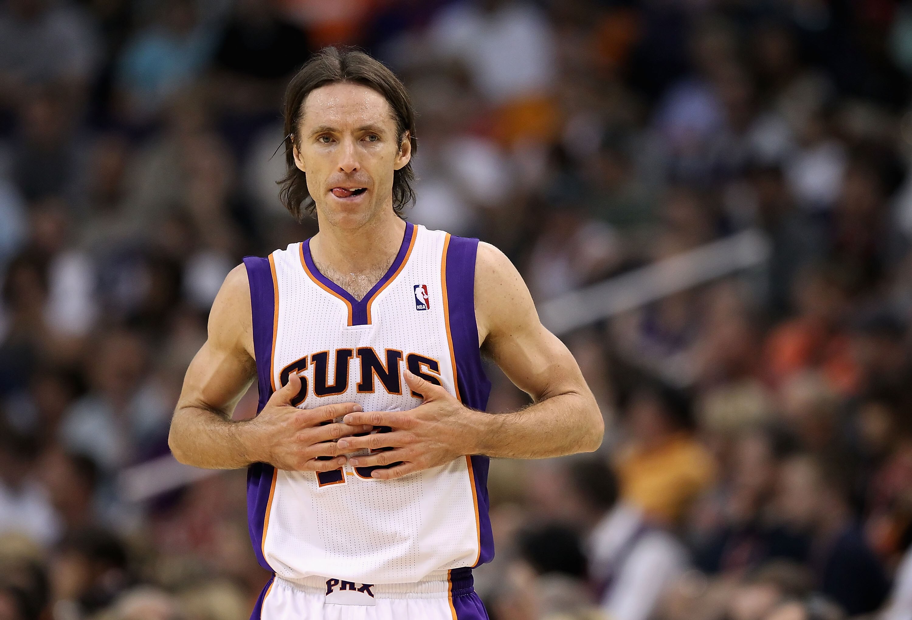 PHOENIX, AZ - MARCH 30:  Steve Nash #13 of the Phoenix Suns in action during the NBA game against the Oklahoma City Thunder at US Airways Center on March 30, 2011 in Phoenix, Arizona. The Thunder defeated the Suns 116-98.  NOTE TO USER: User expressly ack