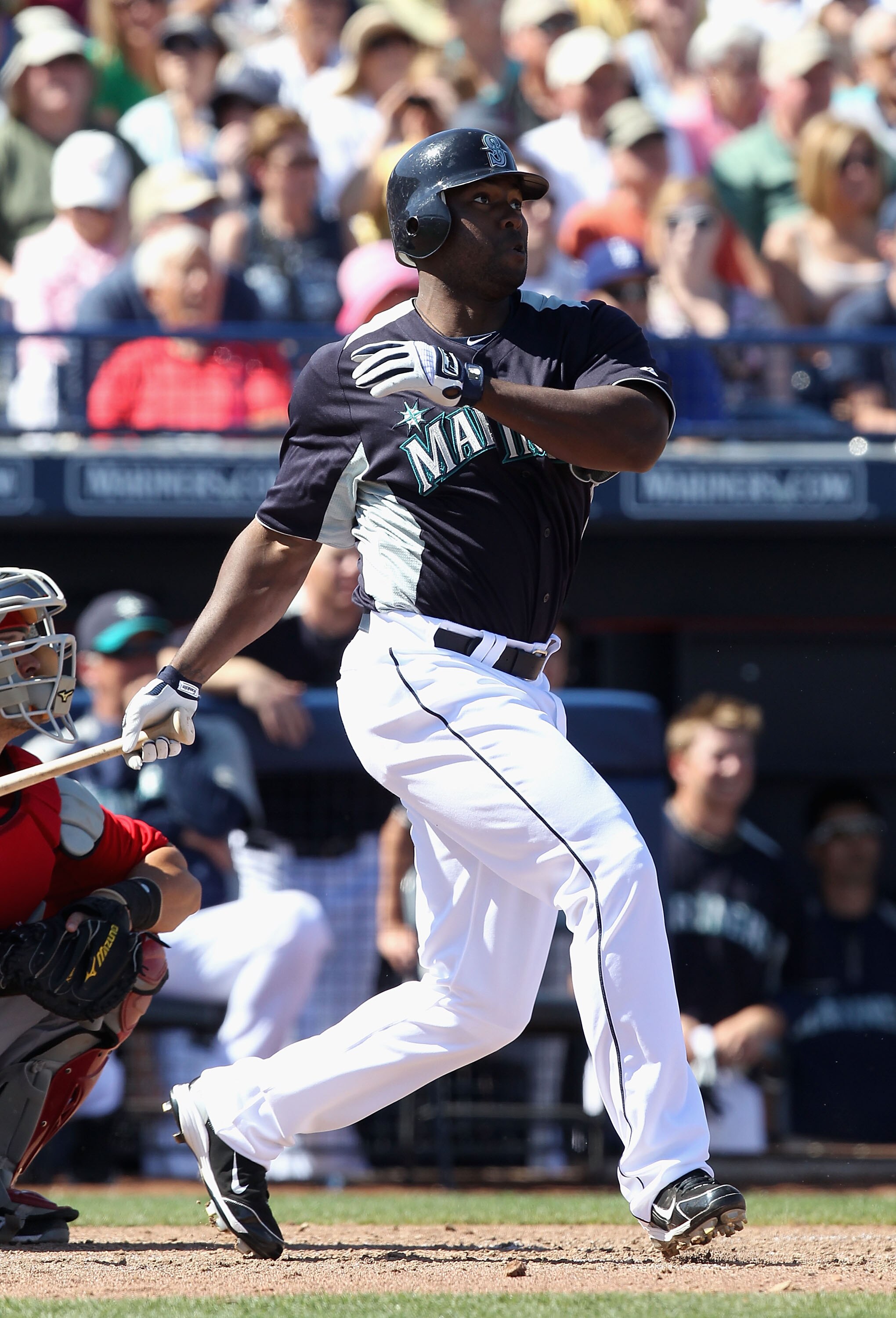 PEORIA, AZ - MARCH 04:  Milton Bradley #15 of the Seattle Mariners bats against the Cincinnati Reds during the spring training game at Peoria Stadium on March 4, 2011 in Peoria, Arizona.  (Photo by Christian Petersen/Getty Images)