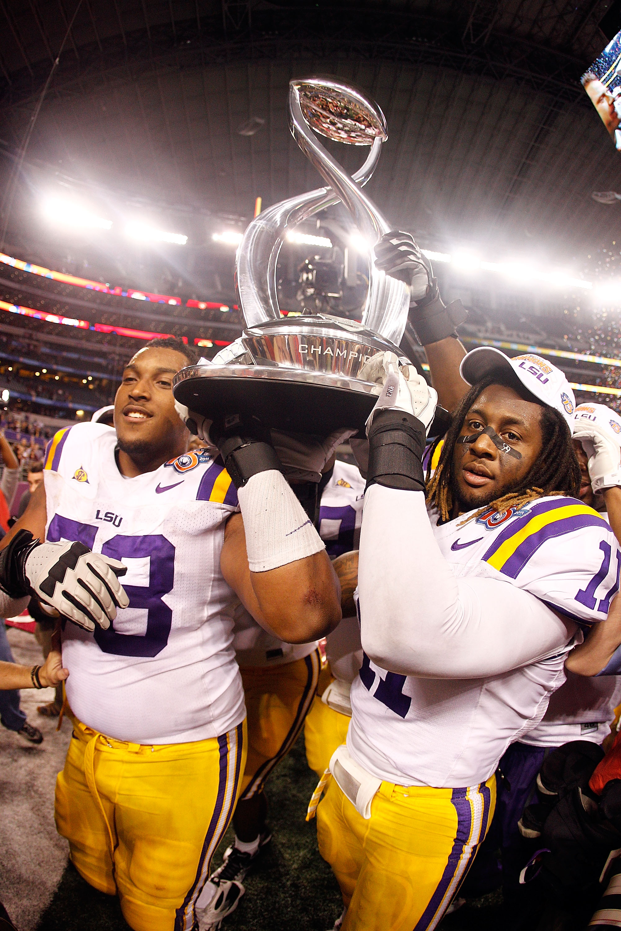 ARLINGTON, TX - JANUARY 07:  Members of the Louisiana State University Tigers celebrate after defeating the Texas A&M Aggies 41-24 during the AT&T Cotton Bowl at Cowboys Stadium on January 7, 2011 in Arlington, Texas.  (Photo by Chris Graythen/Getty Image