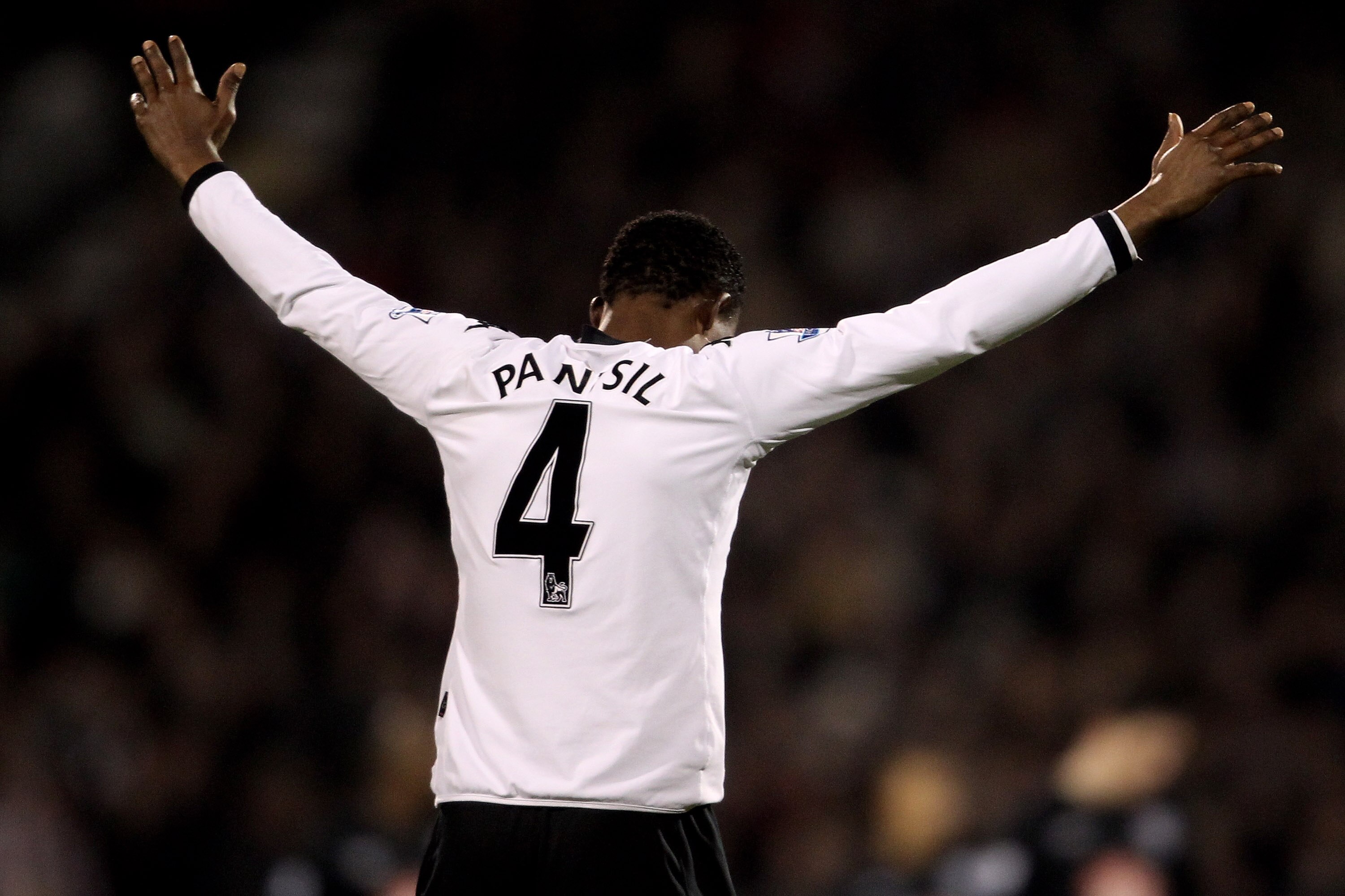 LONDON, ENGLAND - JANUARY 04:  John Pantsil of Fulam reacts during the Barclays Premier League match between Fulham and West Bromwich Albion at Craven Cottage on January 4, 2011 in London, England.  (Photo by Scott Heavey/Getty Images)