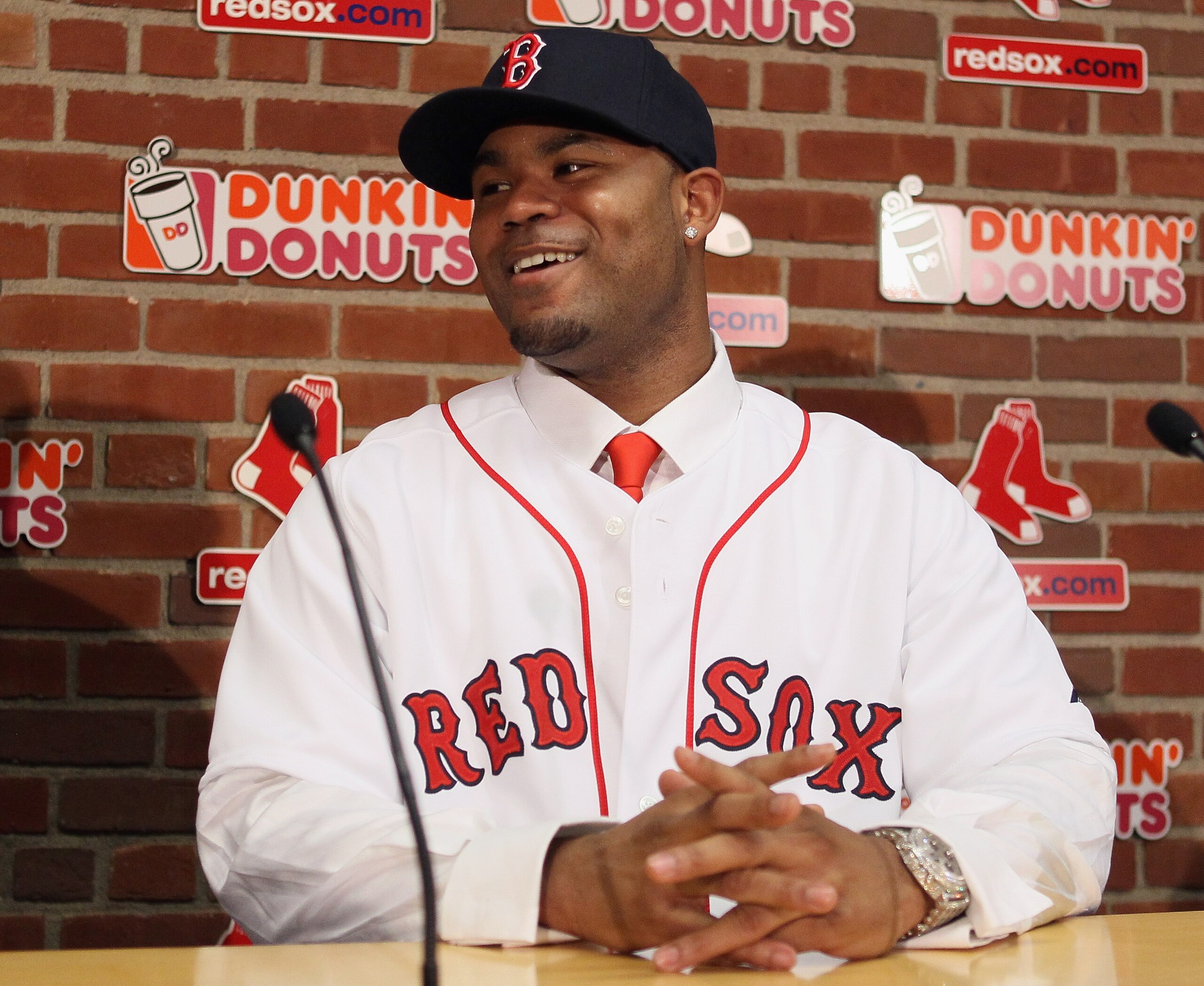 BOSTON, MA - DECEMBER 11: Carl Crawford answers questions during a press conference to announce his joining the Boston Red Sox on December 11, 2010 at the Fenway Park in Boston, Massachusetts. (Photo by Elsa/Getty Images) BOSTON, MA - DECEMBER 11: Carl Crawford answers questions during a press conference to announce his joining the Boston Red Sox on December 11, 2010 at the Fenway Park in Boston, Massachusetts. (Photo by Elsa/Getty Images)