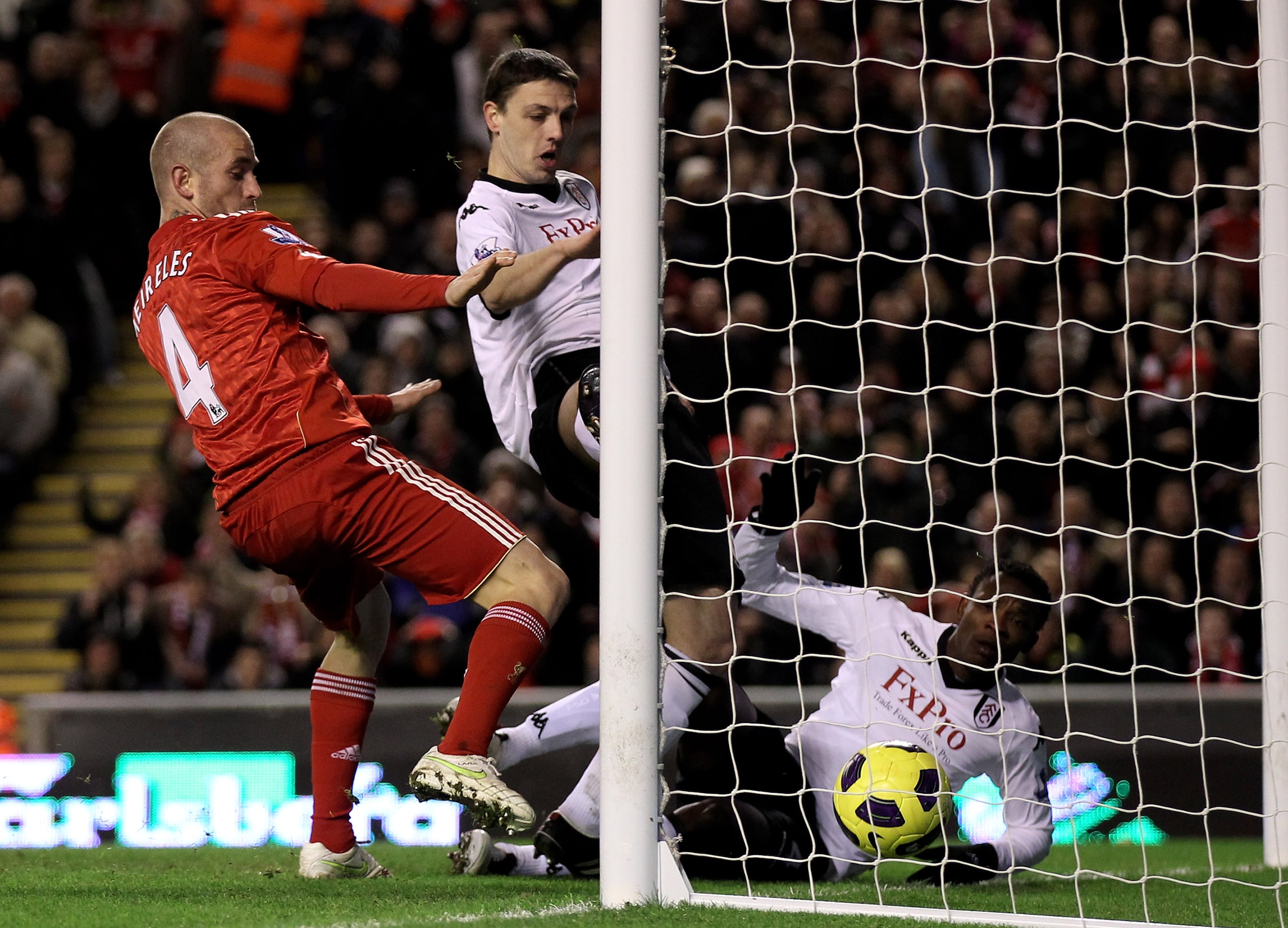LIVERPOOL, ENGLAND - JANUARY 26: John Pantsil of Fulham scores an own goal during the Barclays Premier League match between Liverpool and Fulham at Anfield on January 26, 2011 in Liverpool, England. (Photo by Alex Livesey/Getty Images) LIVERPOOL, ENGLAND - JANUARY 26: John Pantsil of Fulham scores an own goal during the Barclays Premier League match between Liverpool and Fulham at Anfield on January 26, 2011 in Liverpool, England. (Photo by Alex Livesey/Getty Images)