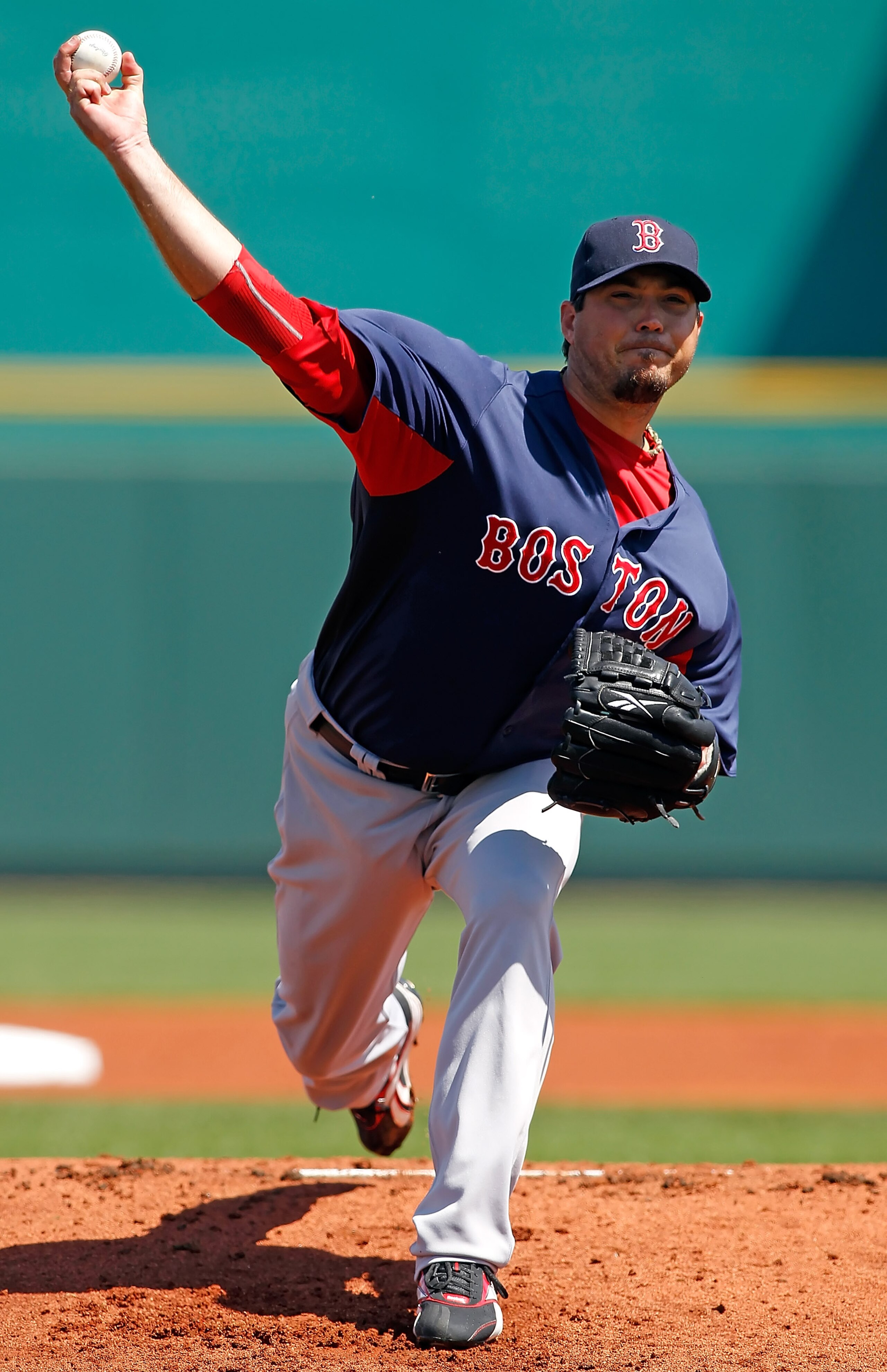 BRADENTON, FL - MARCH 13: Pitcher Josh Beckett #19 of the Boston Red Sox pitches against the Pittsburgh Pirates during a Grapefruit League Spring Training Game at McKechnie Field on March 13, 2011 in Bradenton, Florida. (Photo by J. Meric/Getty Images) BRADENTON, FL - MARCH 13: Pitcher Josh Beckett #19 of the Boston Red Sox pitches against the Pittsburgh Pirates during a Grapefruit League Spring Training Game at McKechnie Field on March 13, 2011 in Bradenton, Florida. (Photo by J. Meric/Getty Images)