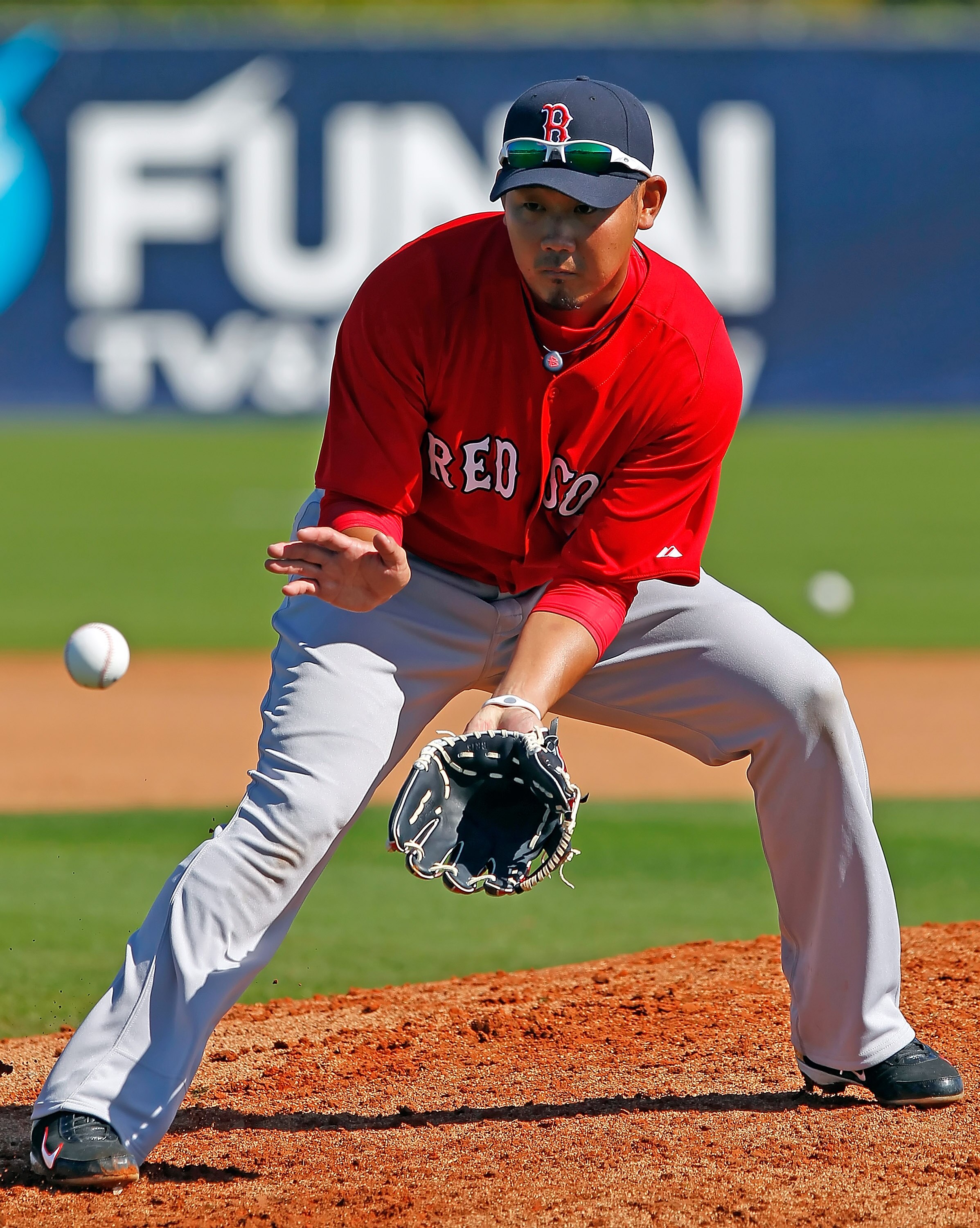 FORT MYERS, FL - FEBRUARY 19:  Pitcher Daisuke Matsuzaka #18 of the Boston Red Sox participates in a drill during a Spring Training Workout Session at the Red Sox Player Development Complex on February 19, 2011 in Fort Myers, Florida.  (Photo by J. Meric/