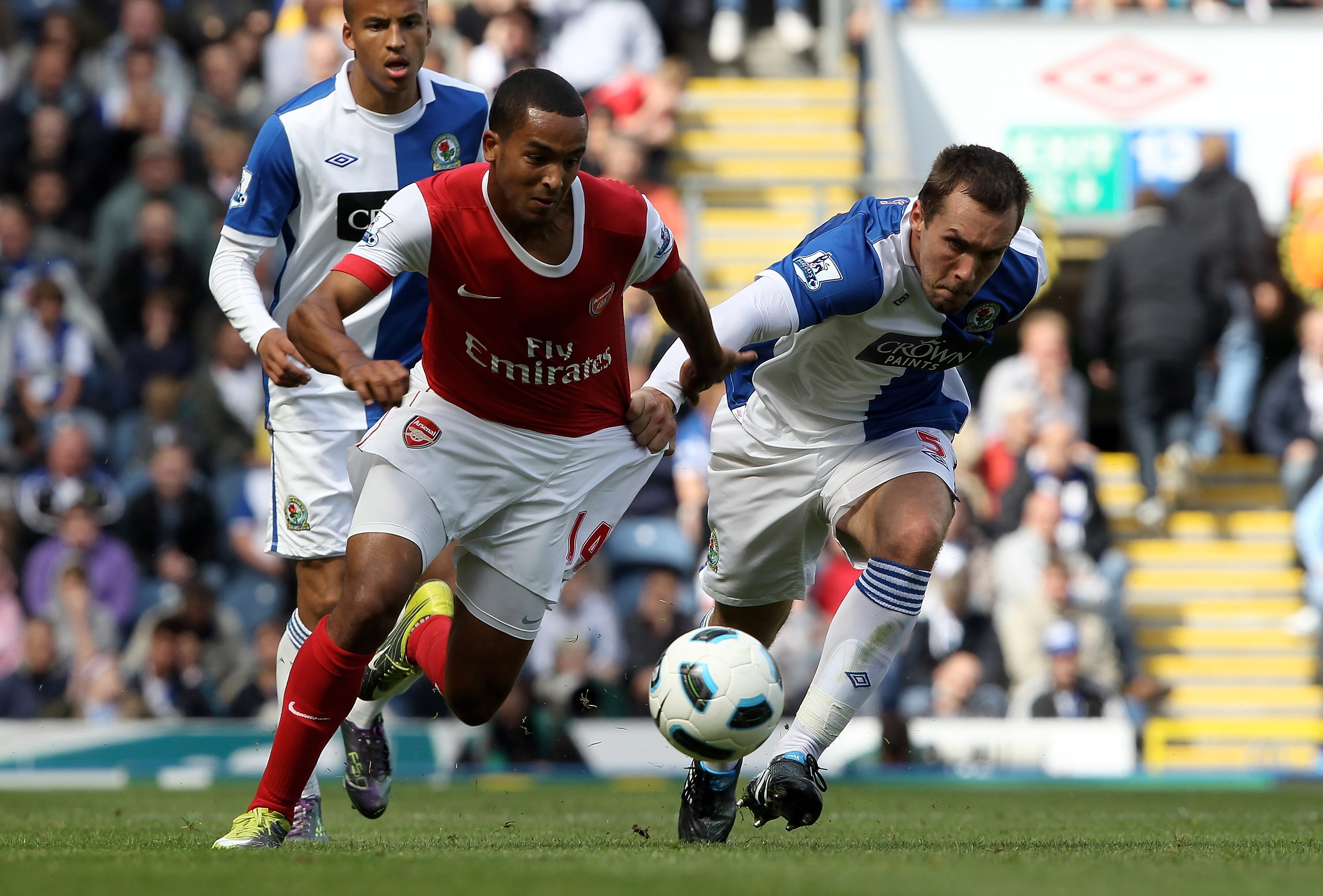 BLACKBURN, ENGLAND - AUGUST 28:  Theo Walcott of Arsenal attempts to move away from Gael Givet of Blackburn Rovers during the Barclays Premier League match between Blackburn Rovers and Arsenal at Ewood Park on August 28, 2010 in Blackburn, England.  (Phot