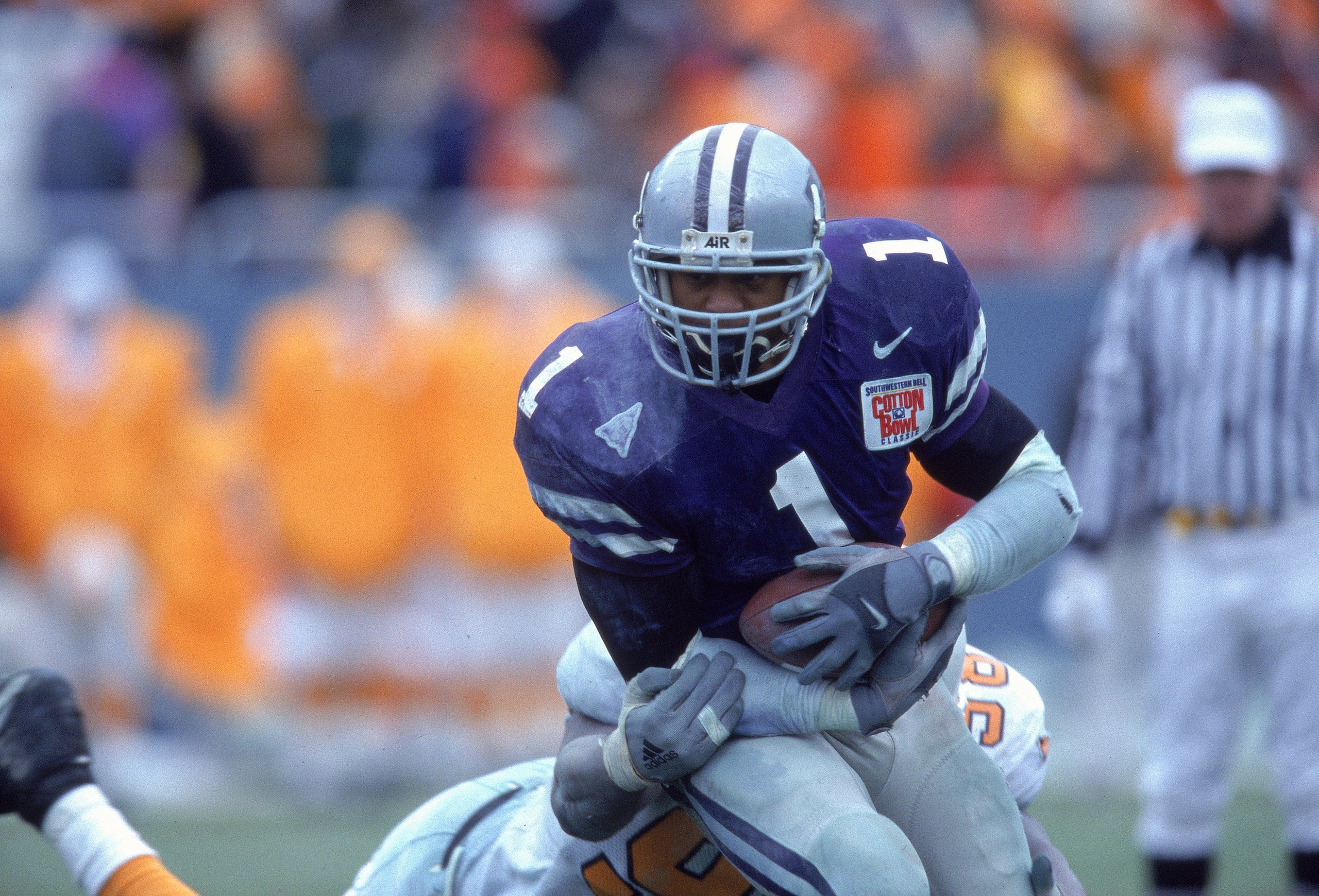 1 Jan 2001:  Josh Scobey #1 of the Kansas State Wildcats goes head to head against John Henderson #98 of the Tennessee Volunteers during the Cotton Bowl game in Dallas, Texas.  The Wildcats defeated the Volunteers 35-21.Mandatory Credit: Ronald Martinez