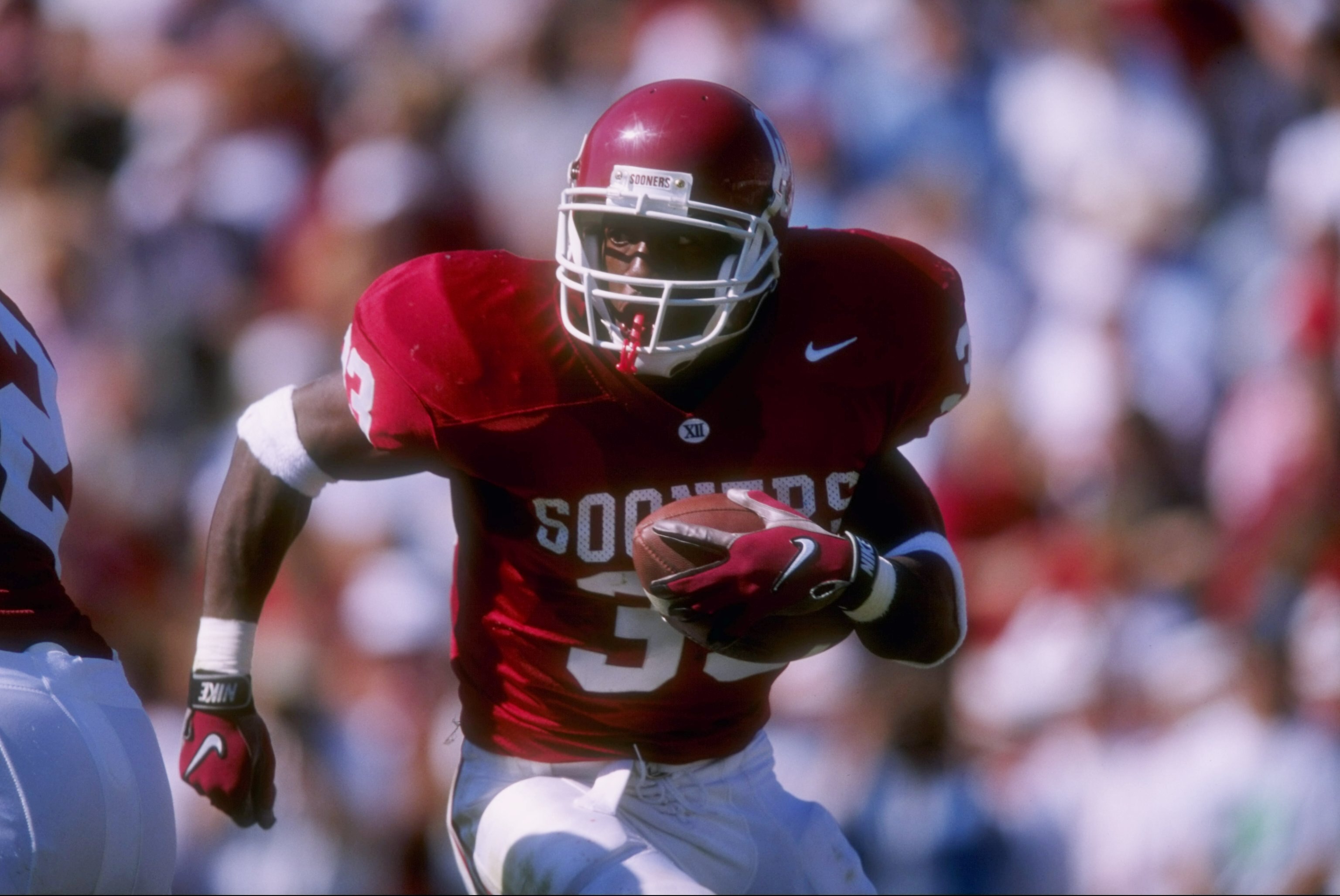 18 Oct 1997:  Halfback Demond Parker of the Oklahoma Sooners runs with the ball during a game against the Baylor Bears at Memorial Stadium in Norman, Oklahoma.  Oklahoma won the game 24-23. Mandatory Credit: Stephen Dunn  /Allsport