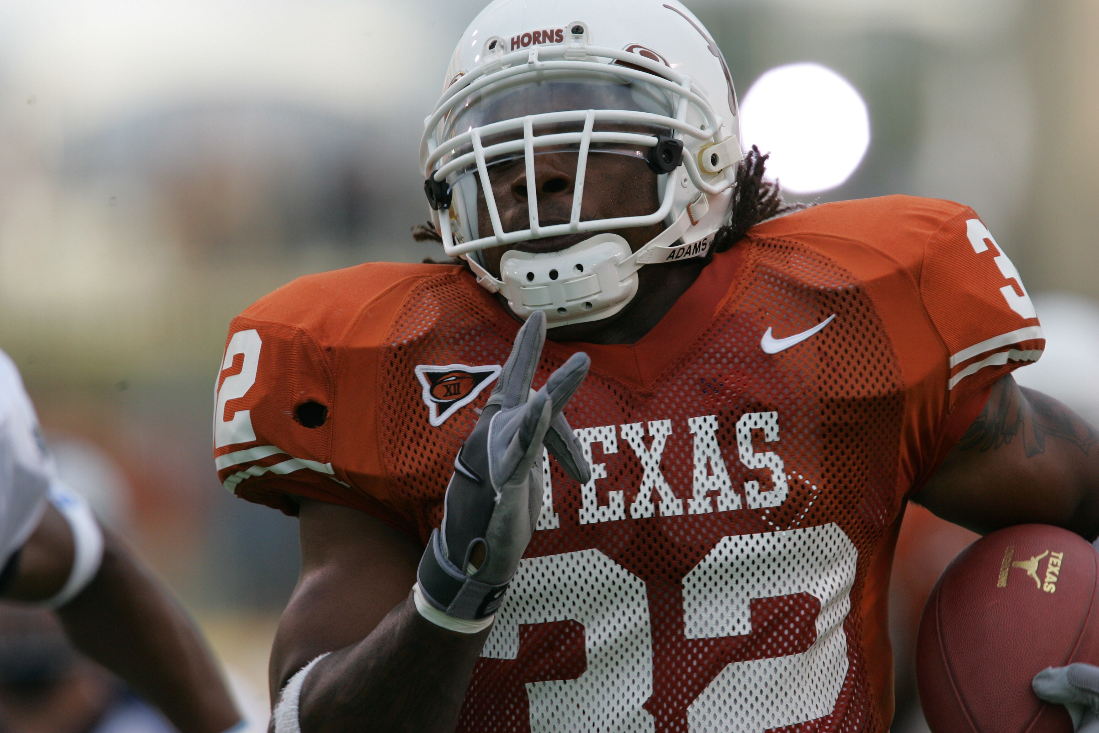 AUSTIN, TX - SEPTEMBER 25:  Running back Cedric Benson #32 of the University of Texas at Austin Longhorns carries the ball against the Rice University Owls during the game on September 25, 2004 at Royal-Memorial Stadium in Austin, Texas.  Texas won 35-13.