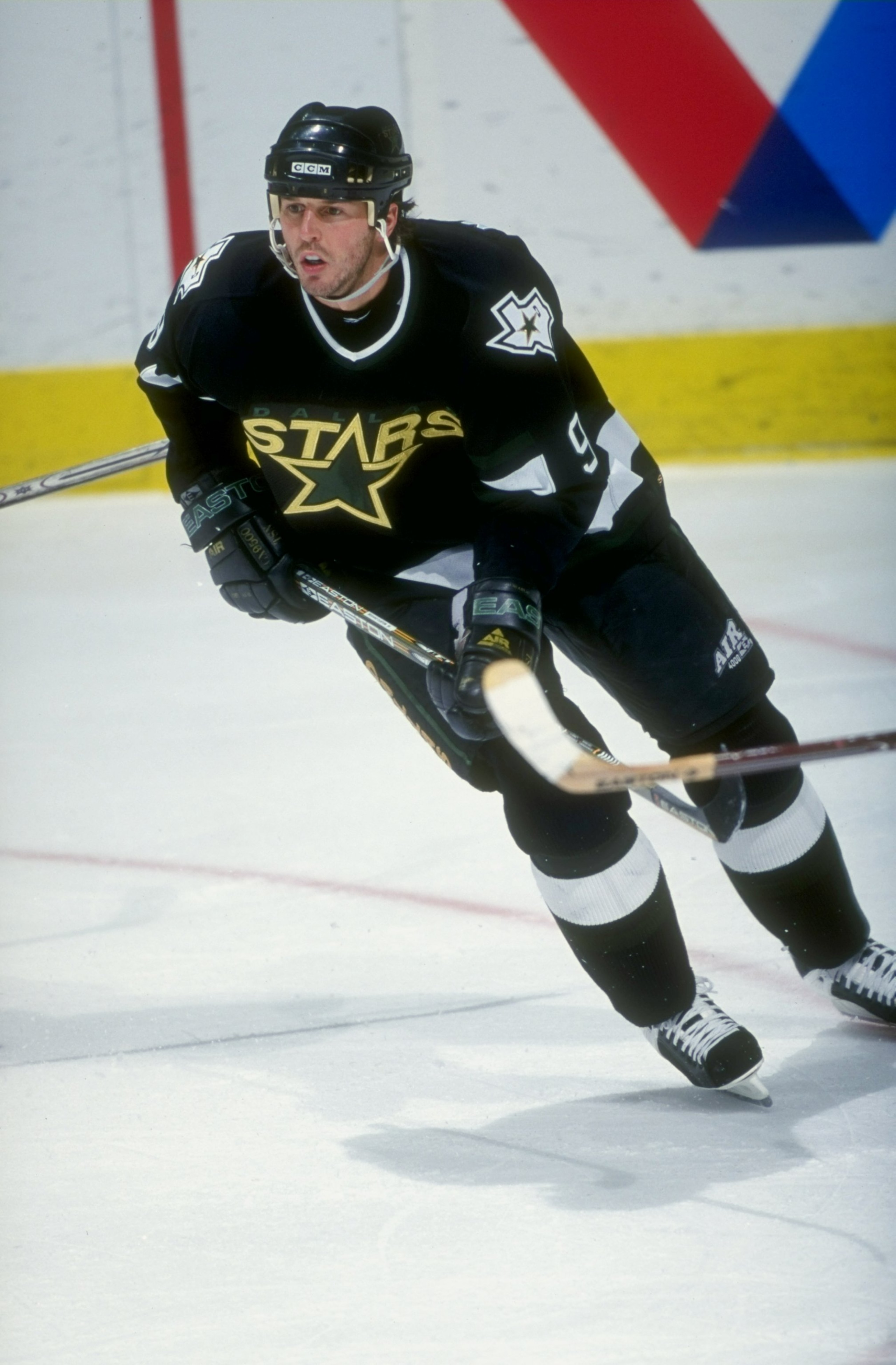 8 Dec 1998:  Center Mike Modano #9 of the Dallas Stars in action during a game against the Calgary Flames at Canadian Airlines Saddledome in Calgary, Canada. The Stars defeated the Flames 3-2. Mandatory Credit: Ian Tomlinson  /Allsport