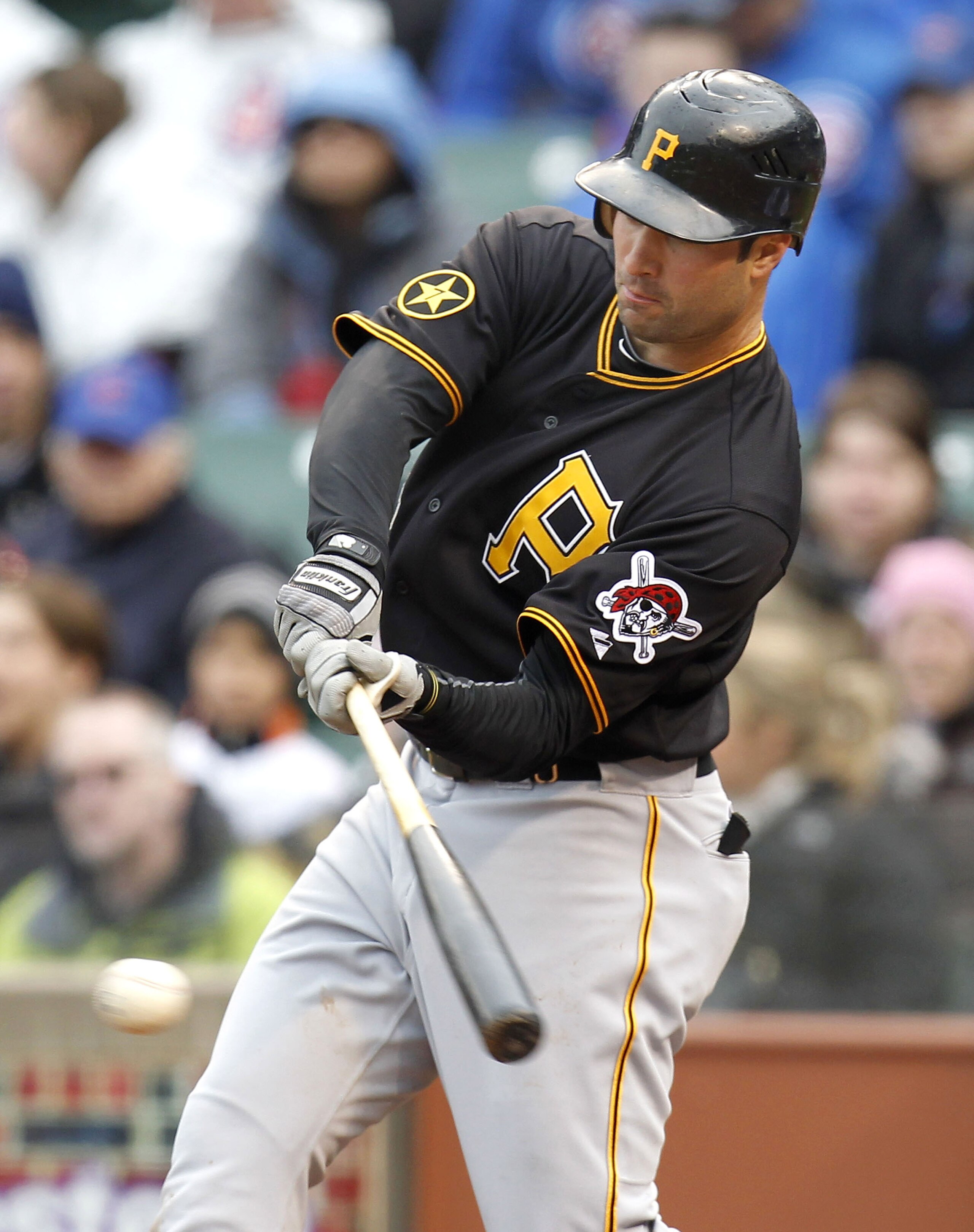 CHICAGO, IL - APRIL 01: Neil Walker #18 of the Pittsburgh Pirates hits a fly out in the fourth inning while playing the Chicago Cubs during opening day at Wrigley Field on April 1, 2011 in Chicago, Illinois. Walker had a grand slam in the game and the Pir CHICAGO, IL - APRIL 01: Neil Walker #18 of the Pittsburgh Pirates hits a fly out in the fourth inning while playing the Chicago Cubs during opening day at Wrigley Field on April 1, 2011 in Chicago, Illinois. Walker had a grand slam in the game and the Pir