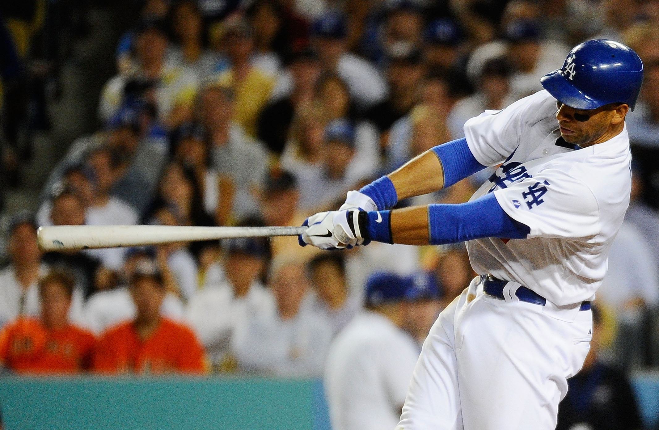 LOS ANGELES, CA - MARCH 31: James Loney #7 of the Los Angeles Dodgers hits a double scoring Matt Kemp #27 in the eighth inning against the San Francisco Giants on Opening Day at Dodger Stadium on March 31, 2011 in Los Angeles, California. (Photo by Kevo LOS ANGELES, CA - MARCH 31: James Loney #7 of the Los Angeles Dodgers hits a double scoring Matt Kemp #27 in the eighth inning against the San Francisco Giants on Opening Day at Dodger Stadium on March 31, 2011 in Los Angeles, California. (Photo by Kevo
