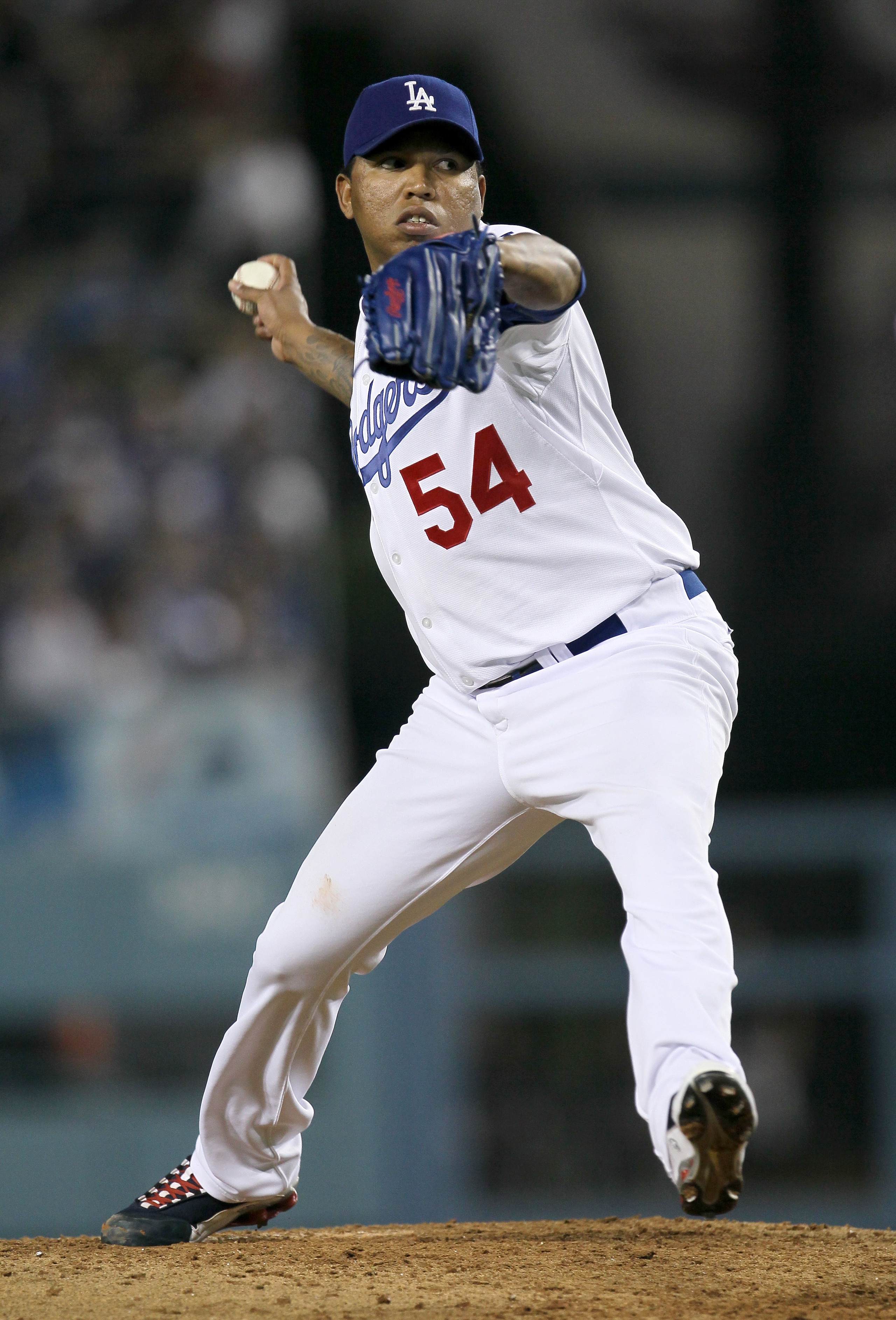 LOS ANGELES, CA - JULY 05: Relief pitcher Ronald Belisario #54 of the Los Angeles Dodgers throws a pitch against the Florida Marlins on July 5, 2010 at Dodger Stadium in Los Angeles, California. (Photo by Stephen Dunn/Getty Images)
