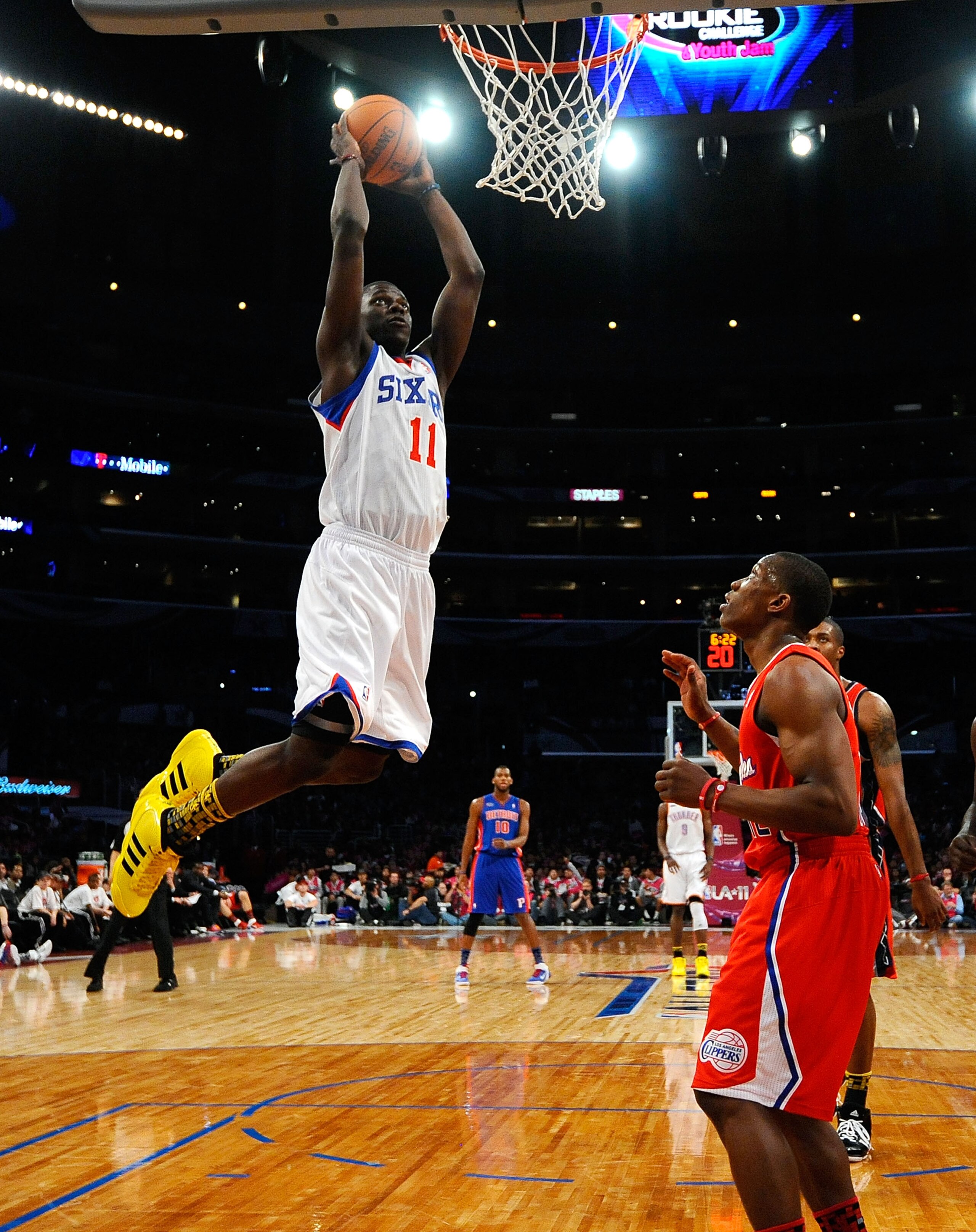 LOS ANGELES, CA - FEBRUARY 18: Jrue Holiday #11 of the Philadelphia 76ers and the Sophomore Team dunks the ball in the first half against the Rookie Team during the T-Mobile Rookie Challenge and Youth Jam at Staples Center on February 18, 2011 in Los Ang LOS ANGELES, CA - FEBRUARY 18: Jrue Holiday #11 of the Philadelphia 76ers and the Sophomore Team dunks the ball in the first half against the Rookie Team during the T-Mobile Rookie Challenge and Youth Jam at Staples Center on February 18, 2011 in Los Ang