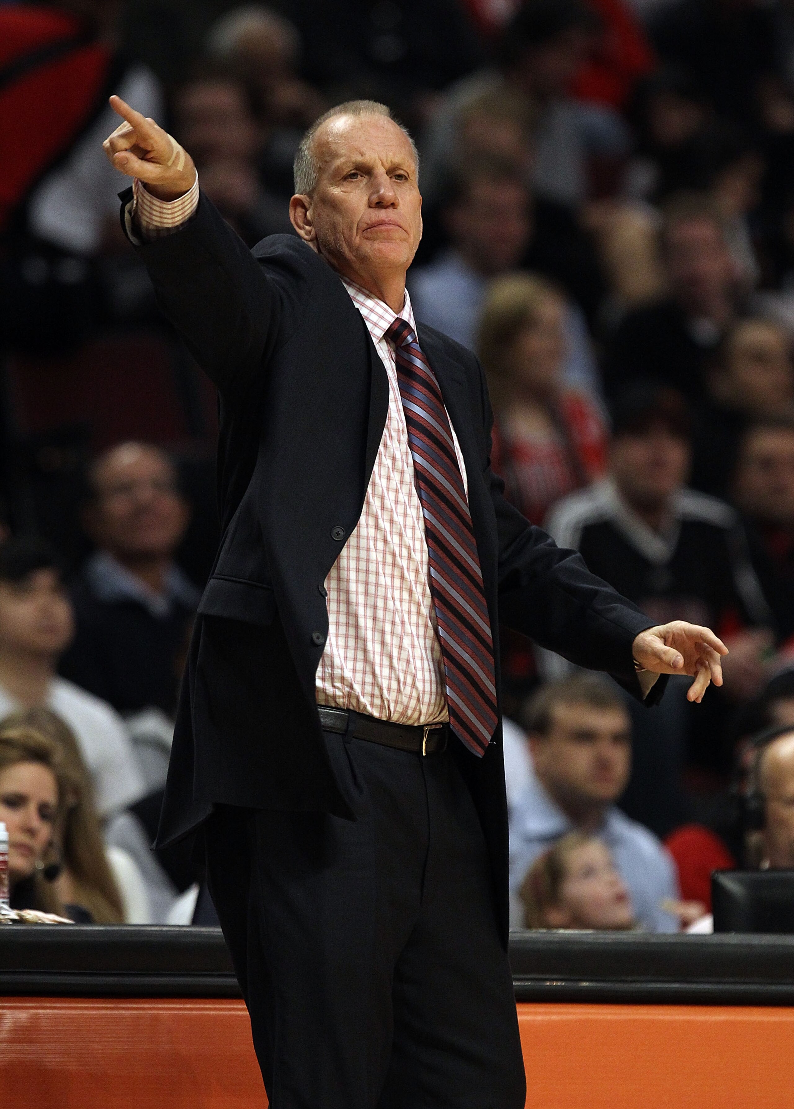 CHICAGO, IL - MARCH 28: Head coach Doug Collins of the Philadelphia 76ers gives instructions to his team during a game against the Chicago Bulls at the United Center on March 28, 2011 in Chicago, Illinois. The 76ers defeated the Bulls 97-85. NOTE TO USER: CHICAGO, IL - MARCH 28: Head coach Doug Collins of the Philadelphia 76ers gives instructions to his team during a game against the Chicago Bulls at the United Center on March 28, 2011 in Chicago, Illinois. The 76ers defeated the Bulls 97-85. NOTE TO USER: