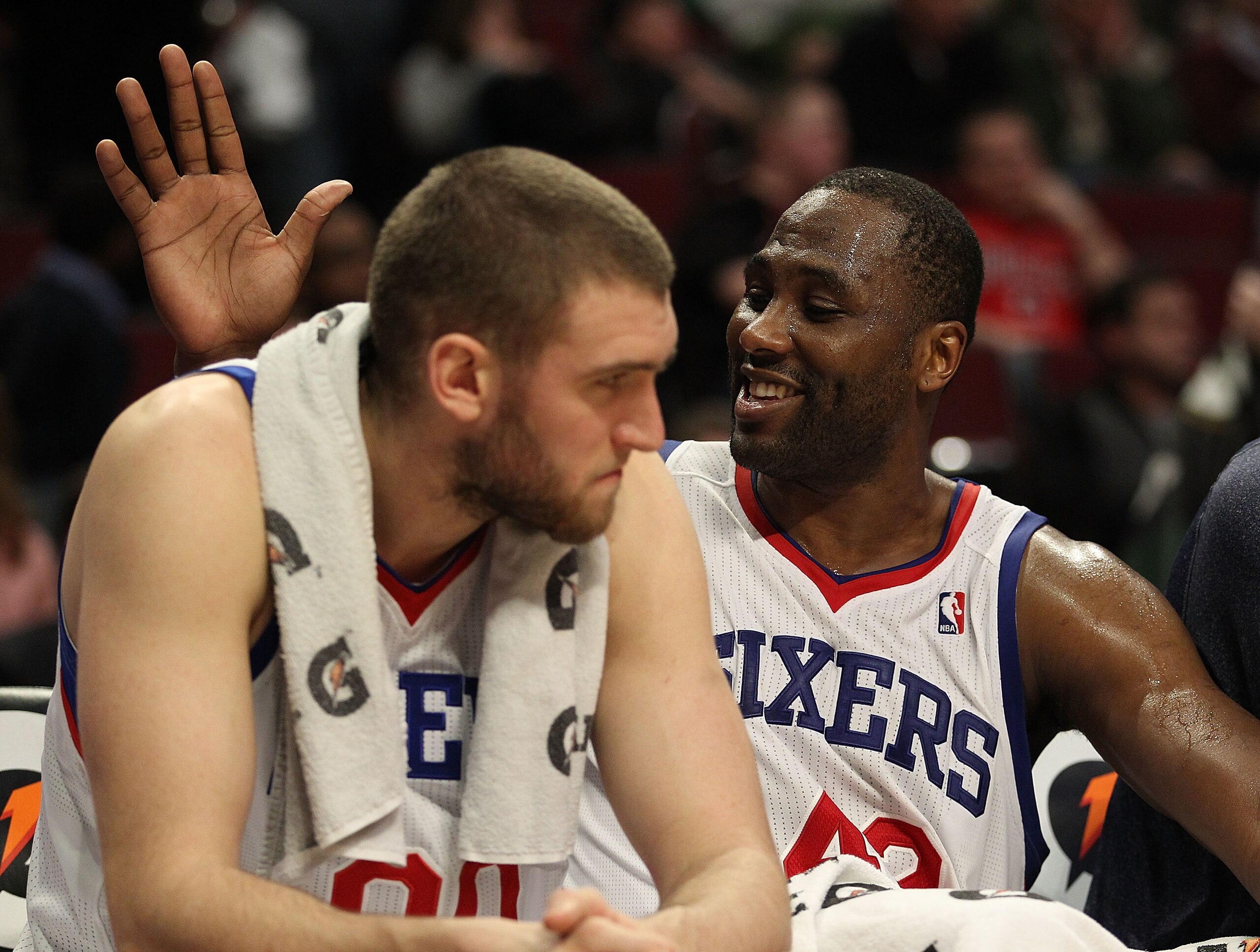 CHICAGO, IL - MARCH 28: Elton Brand #42 of the Philadelphia 76ers slaps teammate Spencer Hawes #00 on the back at the end of a win over the Chicago Bulls at the United Center on March 28, 2011 in Chicago, Illinois. The 76ers defeated the Bulls 97-85. NOTE CHICAGO, IL - MARCH 28: Elton Brand #42 of the Philadelphia 76ers slaps teammate Spencer Hawes #00 on the back at the end of a win over the Chicago Bulls at the United Center on March 28, 2011 in Chicago, Illinois. The 76ers defeated the Bulls 97-85. NOTE